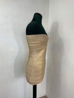Herve Leger golden party dress