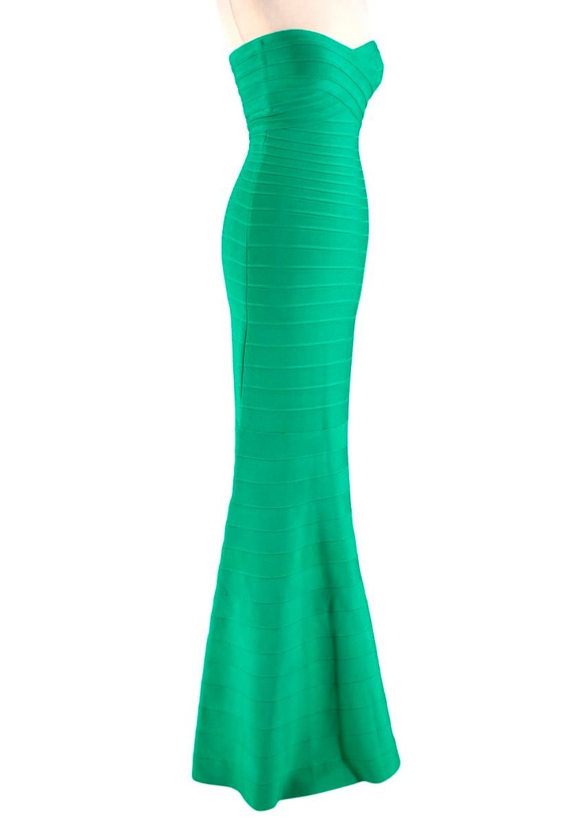 Herve Leger - Green Sara Strapless Bandage Gown

- flattering body con fit with flared skirt 
- bandage strips 
- zip up fastening at the back 
- stretch fabric 
- heavy

- 91% Rayon, 8% Nylon, 1% Spandex
- Dry Clean Only 
- Made in China

Approx in