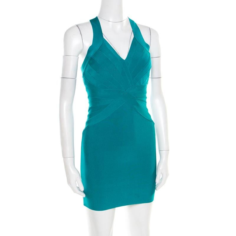 Every detail of this dress from Herve Leger makes a statement and imparts a chic finish. It features a bandage construction that creates a sleek silhouette and a plunging neckline. The stunning jade green colour along with rear zip fastening further