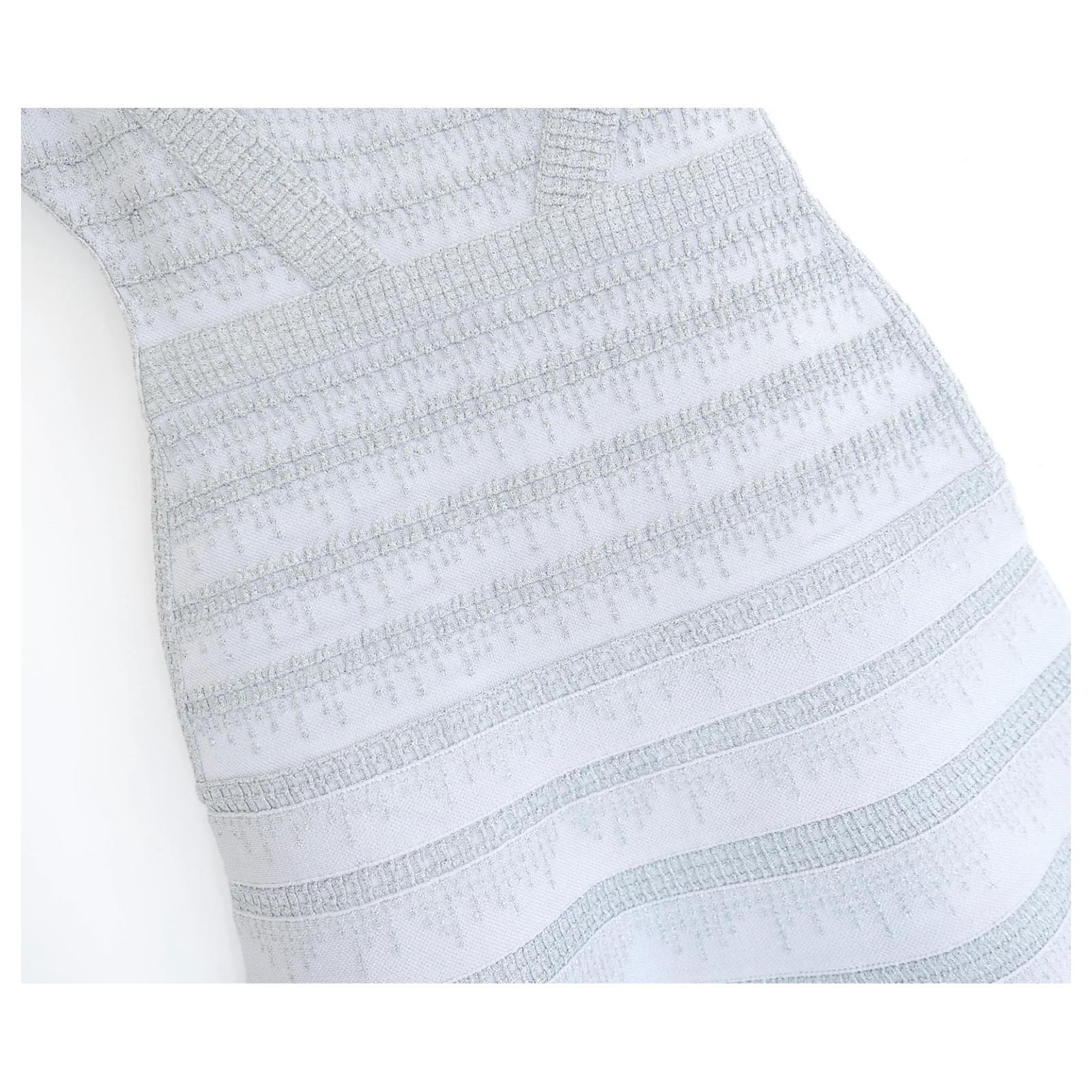 gorgeous, ice queen Herve Leger Carole dress - bought for £1125 and new with tags. Made from Leger's signature super stretchy, thick 'cinch you in' rayon mix in a gorgeous icy Pearl Blue shade with beautiful sparkling knit detailing. It has super