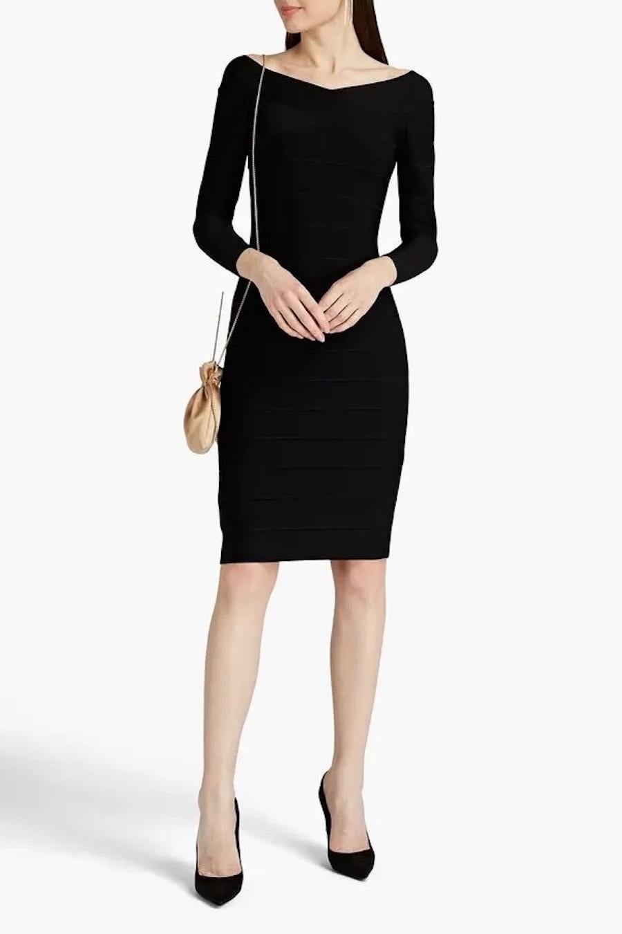 Robe bandage noire Herve Leger super sexy - achetée 995 $ et neuve avec les étiquettes, y compris l'étiquette de retour amovible au dos. u2028Réalisé en rayonne, nylon et élasthanne super extensibles et épais de Léger, il est doté d'un bandage et