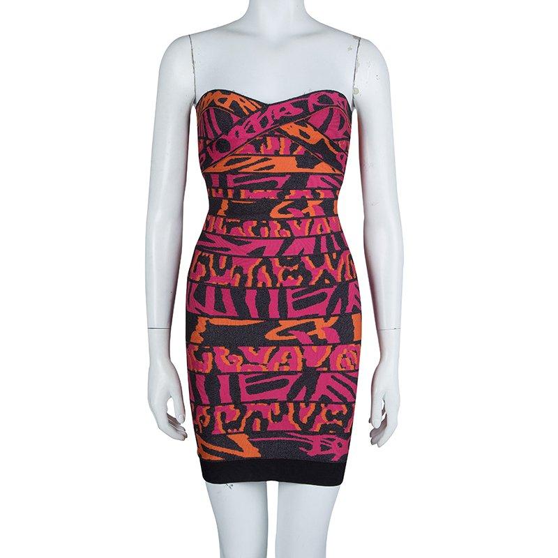 This Bandage Dress by Herve Leger is a striking apparel under the label's signature collections. Crafted in rayon, nylon and spandex blend, the jacquard knit dress features multicolored details with figure-defining contour bands. Sitting just above