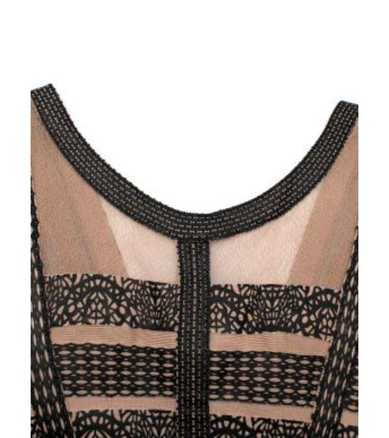 Herve Leger nude and black leather embellished dress

- Leather overlay on a mesh back
- mid-weight
- fitted classic bandage style
- Zip at the back.

Made in China.
Do not dry clean, spot clean. 
Condition 9.510.

PLEASE NOTE, THESE ITEMS ARE