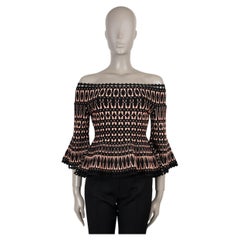 HERVE LEGER Top rosa e nero in rayon, maglia jacquard geometrica, spalle scoperte, taglia L
