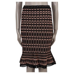 Falda de punto jacquard geométrico de rayón rosa y negro de HERVE LEGER, talla L