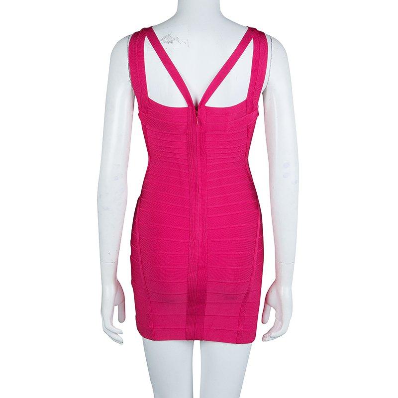 Herve Leger's Bandage Dress is a sharp and alluring evening apparel. Crafted from rayon, nylon and spandex blend, the mini silhouette is designed for a body sculpting accent and features feminine cut-outs. This dress is equipped with a rear zipper.
