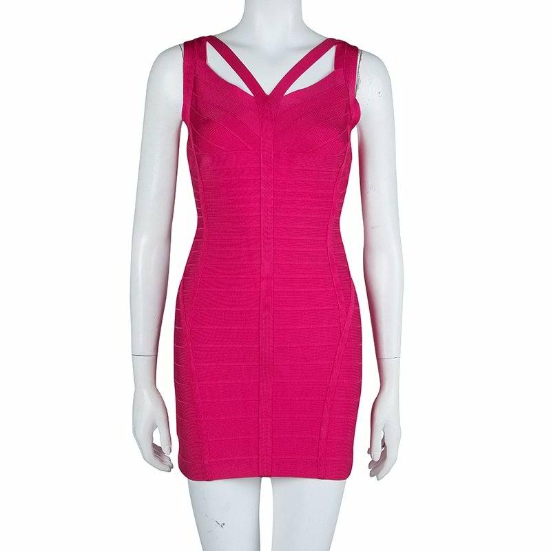 Herve Leger's Bandage Dress is a sharp and alluring evening apparel. Crafted from rayon, nylon and spandex blend, the mini silhouette is designed for a body sculpting accent and features feminine cut-outs. This dress is equipped with a rear zipper.