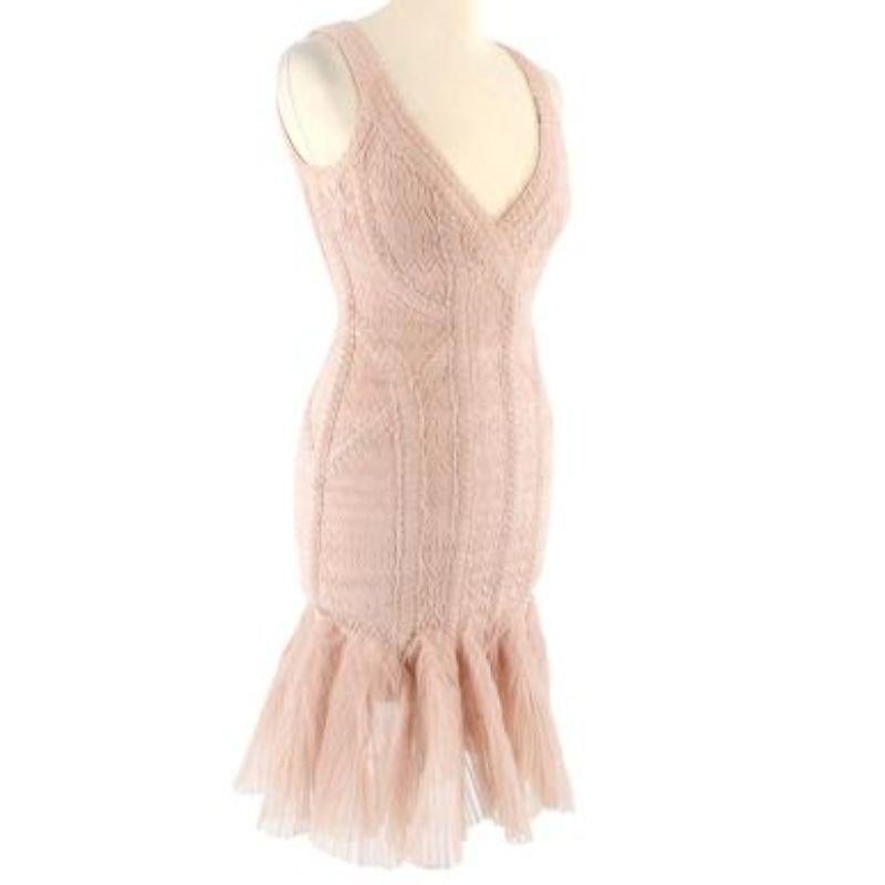 Herve Leger Pink Tulle Trimmed Mini Bandage Dress

- V neckline
- Concealed zip fastening in the back
- Accentuated waist
- Sheer frill details
- Bandage paneling
- Stretch

Material
90% Rayon
9% Nylon
1% Spandex

Dry clean only

Made in