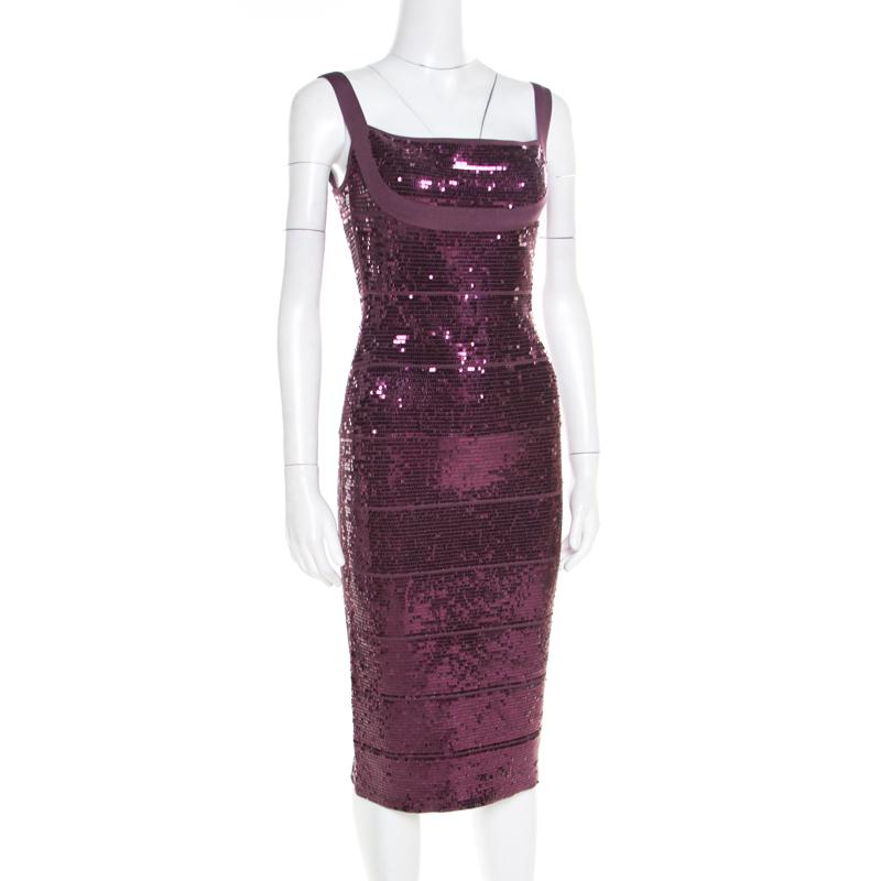Every detail of this dress from Herve Leger makes a statement and imparts a chic finish. It features a bandage construction that creates a sleek silhouette and a deep back. The stunning prune colour along with sequin embellishments and a rear zip