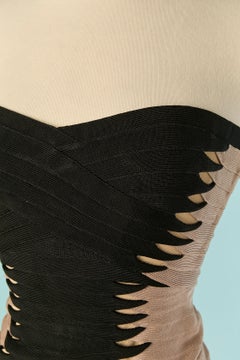 Vestido sin tirantes de Hervé Léger con bandas elásticas negras y beige