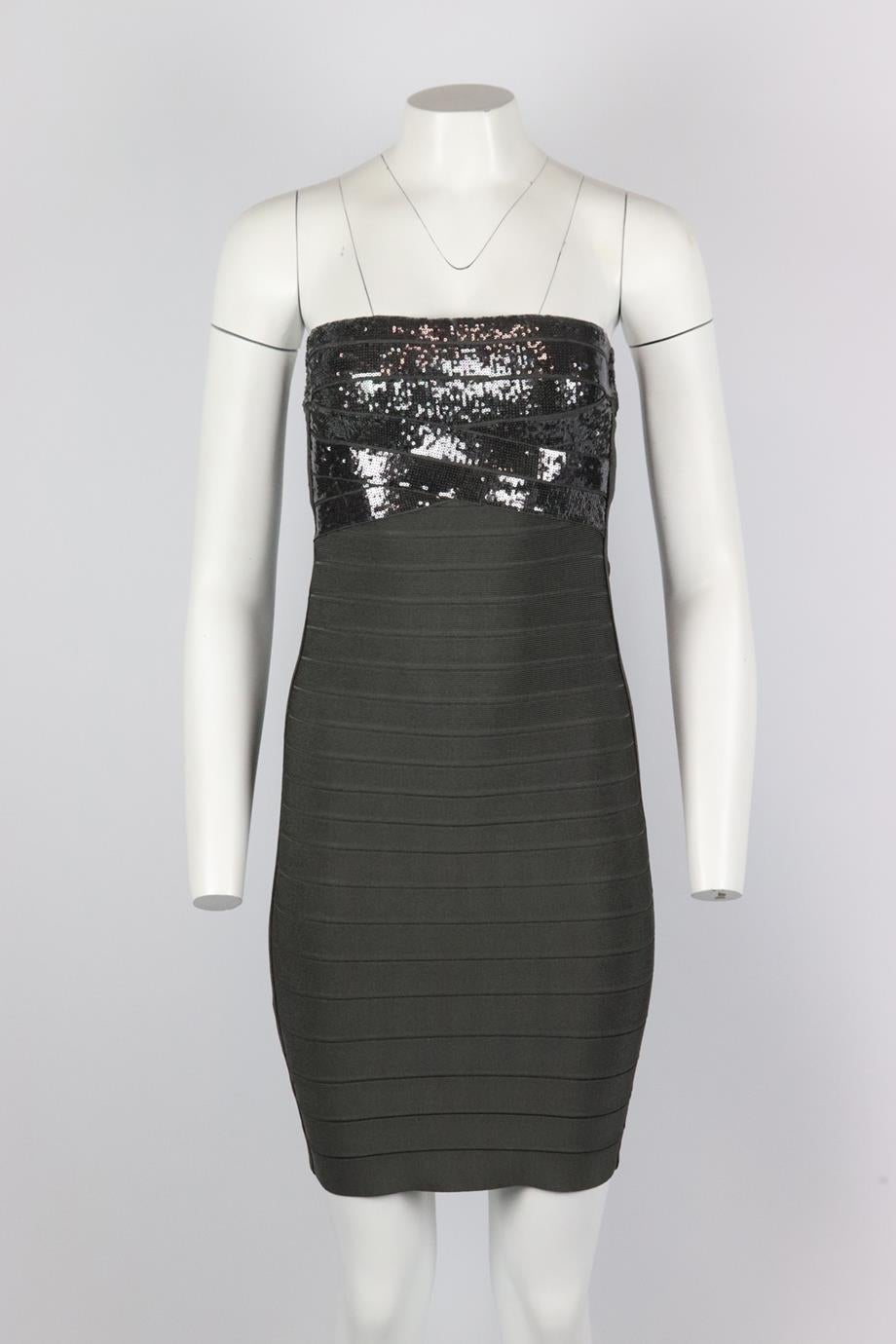 Herve Leger strapless sequined bandage mini dress. Dark-grey. Sleeveless, bandeau. Zip fastening at back. 90% Rayon, 9% nylon, 1% spandex. Size: Small (UK 8, US 4, FR 36, IT 40). Bust: 28.4 in. Waist: 26 in. Hips: 30.4 in. Length: 29 in. Very good