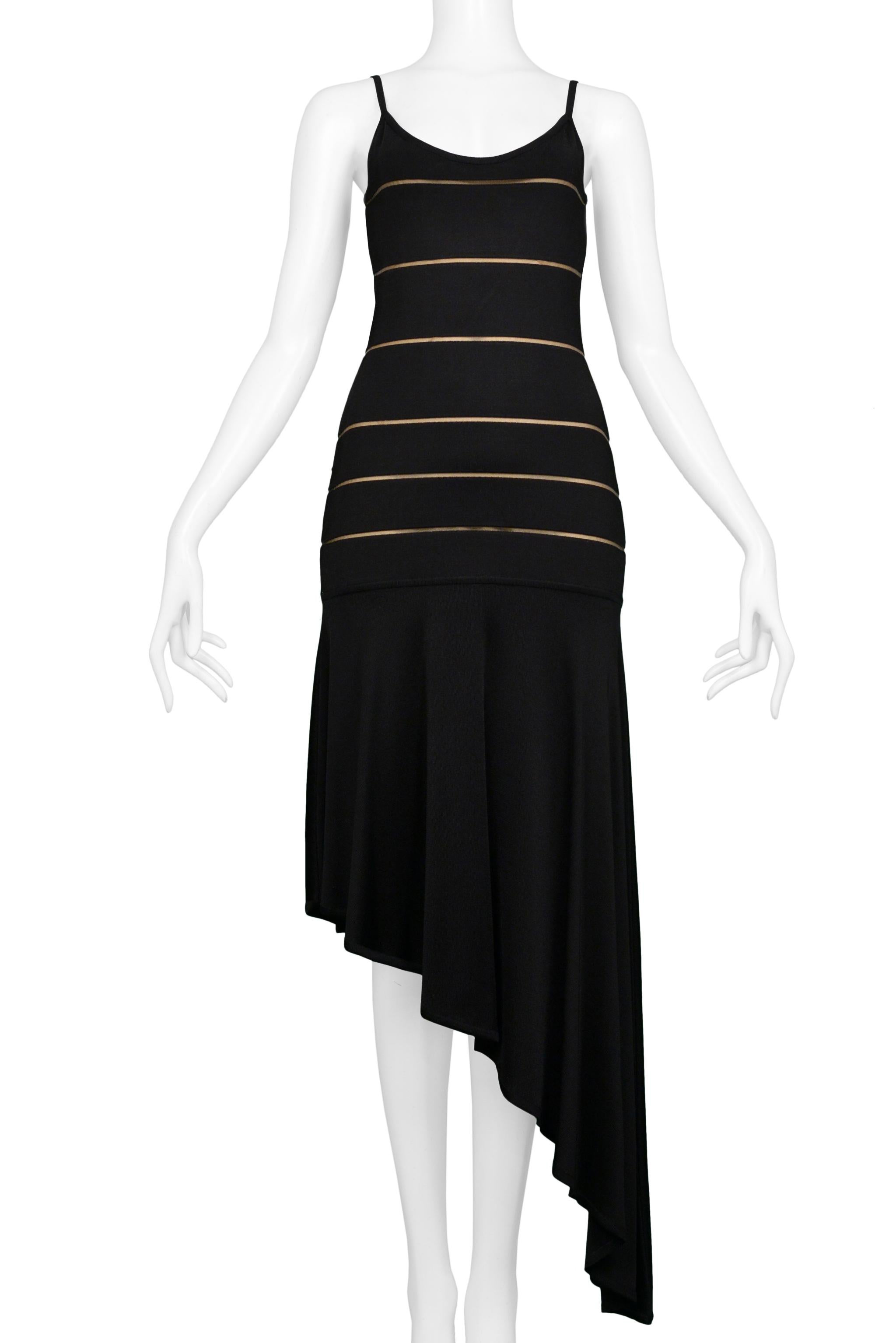 Resurrection Vintage is excited to offer a vintage Herve Leger black dress featuring an asymmetrical hem line, striped body, and spaghetti straps.

Herve Leger
Size X-Small
Rayon, Elastane, & Nylon
Circa 1990s
Excelent Vintage Condition
Authenticity