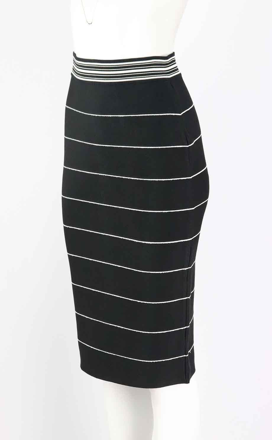 This skirt by Hervé Léger is made from the brand's signature bandage material in an striped black and white hue, sitting high on the waist, it's finely knitted for a close fit. Black and white rayon-blend. Zip fastening at back. 90% Rayon, 9% nylon,