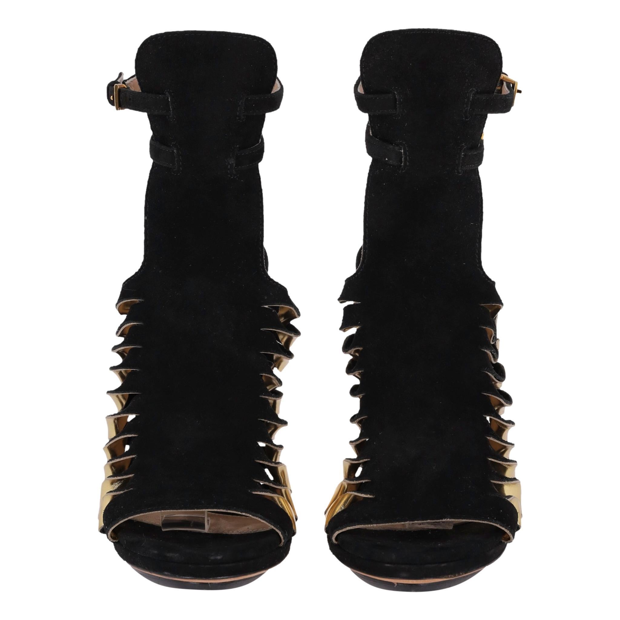 Herve Leger - Tacchi da gladiatore in pelle scamosciata

Tacchi neri 