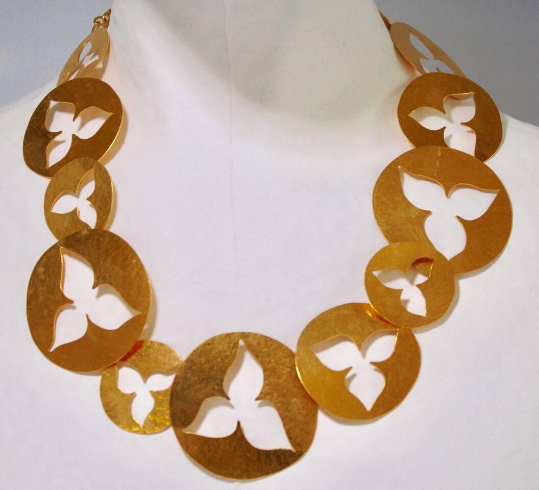 Gilded brass petal cutout necklace from Herve van der Straeten. This designer is no longer producing jewelry, these items are now collectors items!

Necklace can be worn as short as 18
