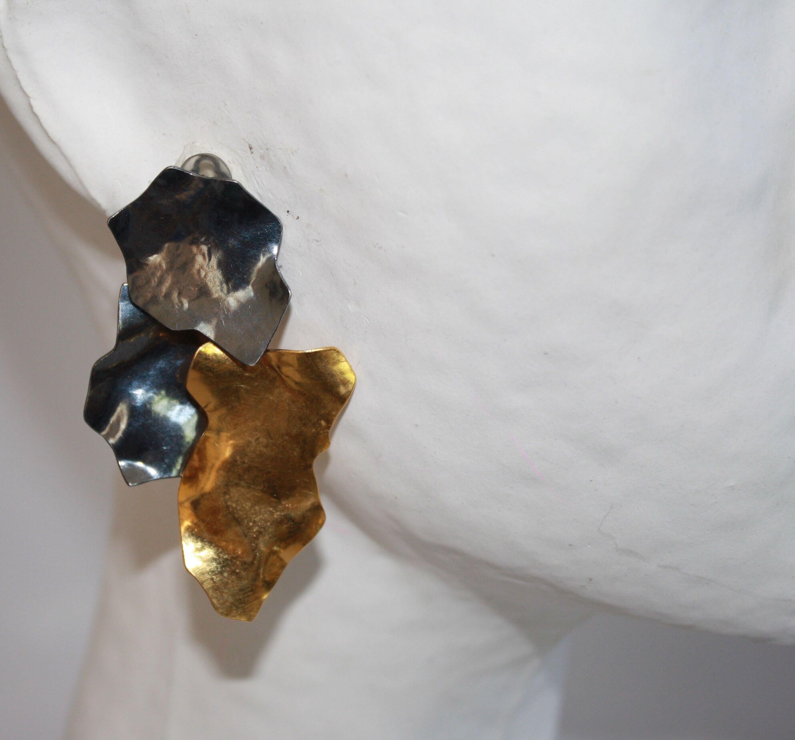 Ruthenium and gold plated brass clip earrings from Herve van der Straeten. 
