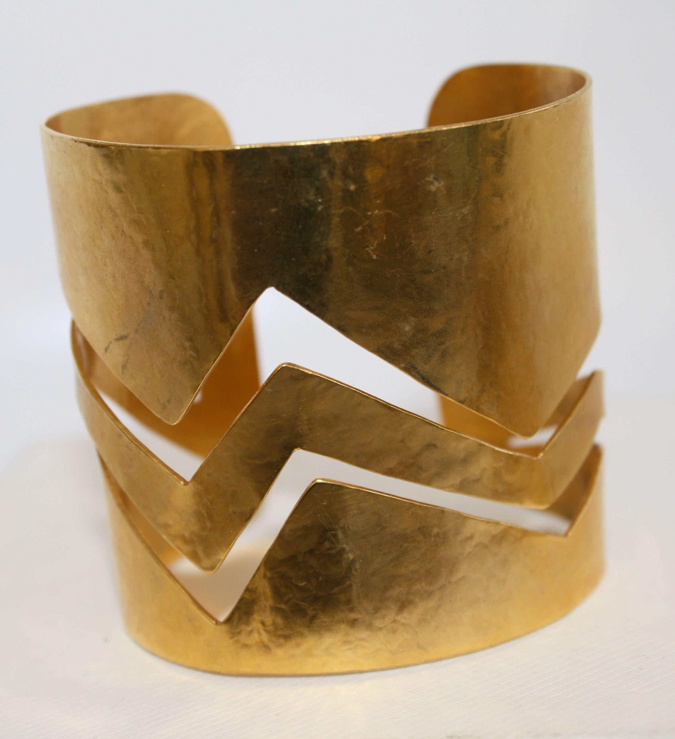 Gilded bronze malleable cuff in zig-zag pattern from Herve van der Straeten. This designer is no longer designing jewelry, making all remaining pieces collectors items!