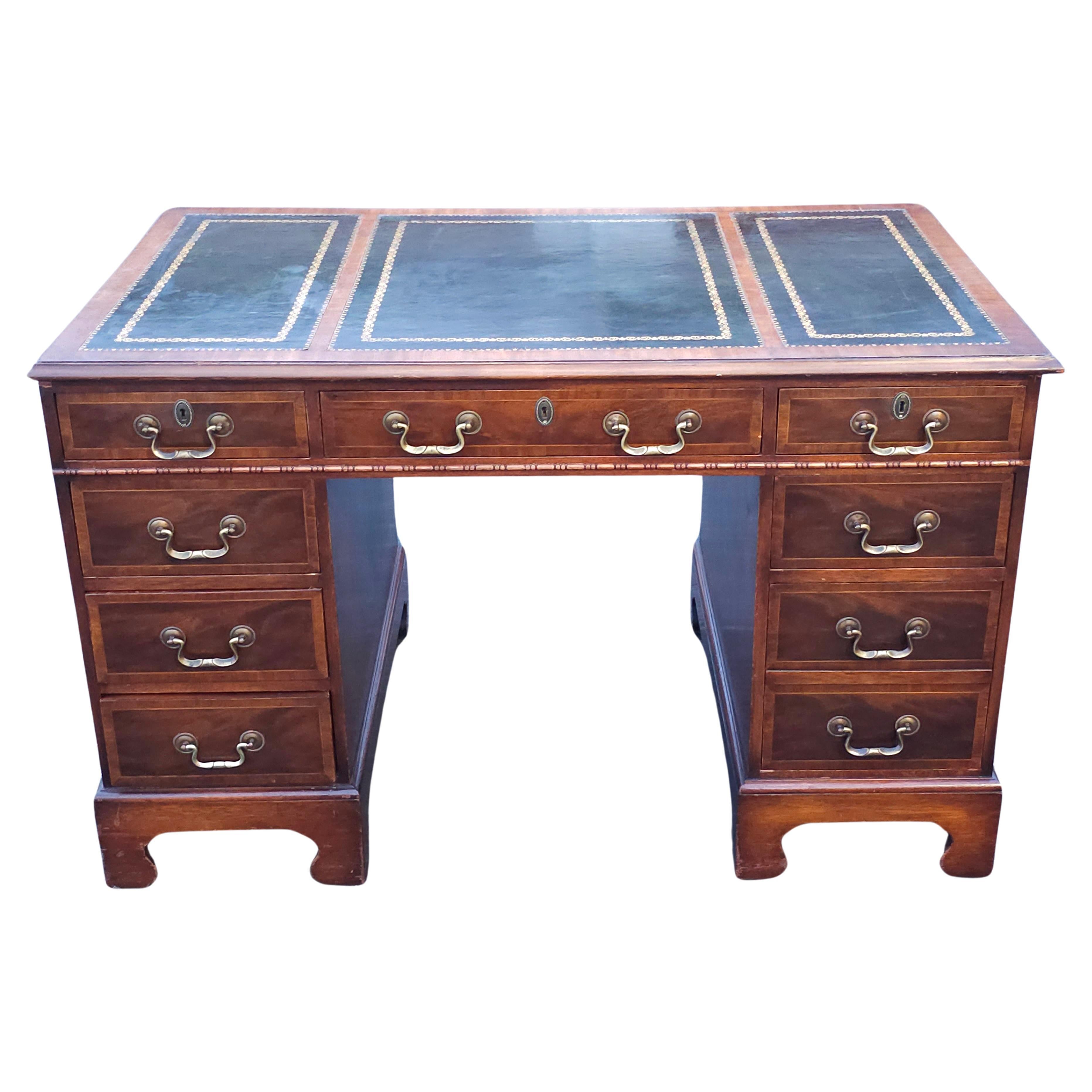 A rare Hespeler Furniture Company Chippendale Inlaid Mahogany and Tooled Green Leather and Stenciled Top Desk .Measures 48.5