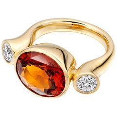 Hessonite Garnet and Diamond Three-Stone Ring 18 Karat Gold