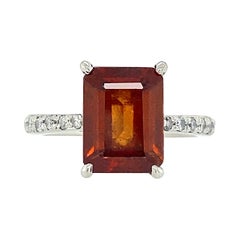 Hessonite Garnet in Platinum Solitaire Ring with Pavé Diamond Shoulders