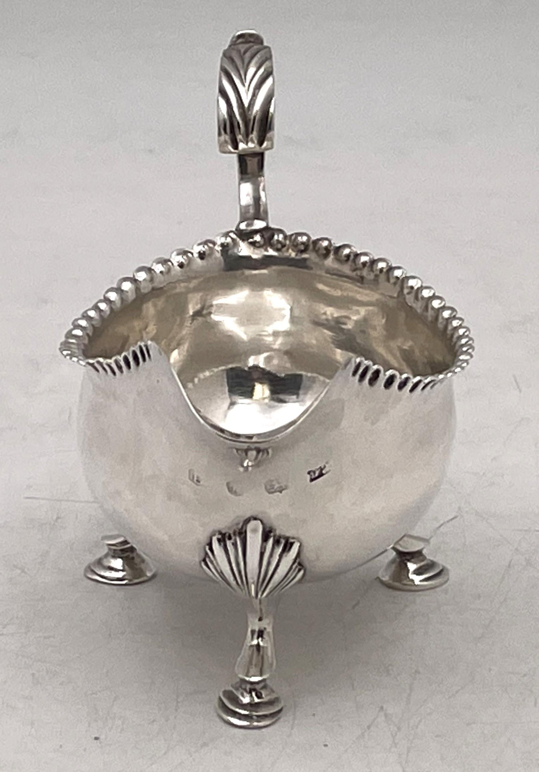 Rare Hester Bateman sterling silver sauce boat from 1782 in an elegant Georgian style. It measures 5 1/2'' from handle to spout by 3'' in height and weighs 3.1 troy ounces.  

The Bateman family are the most famous silversmiths of the Georgian era.