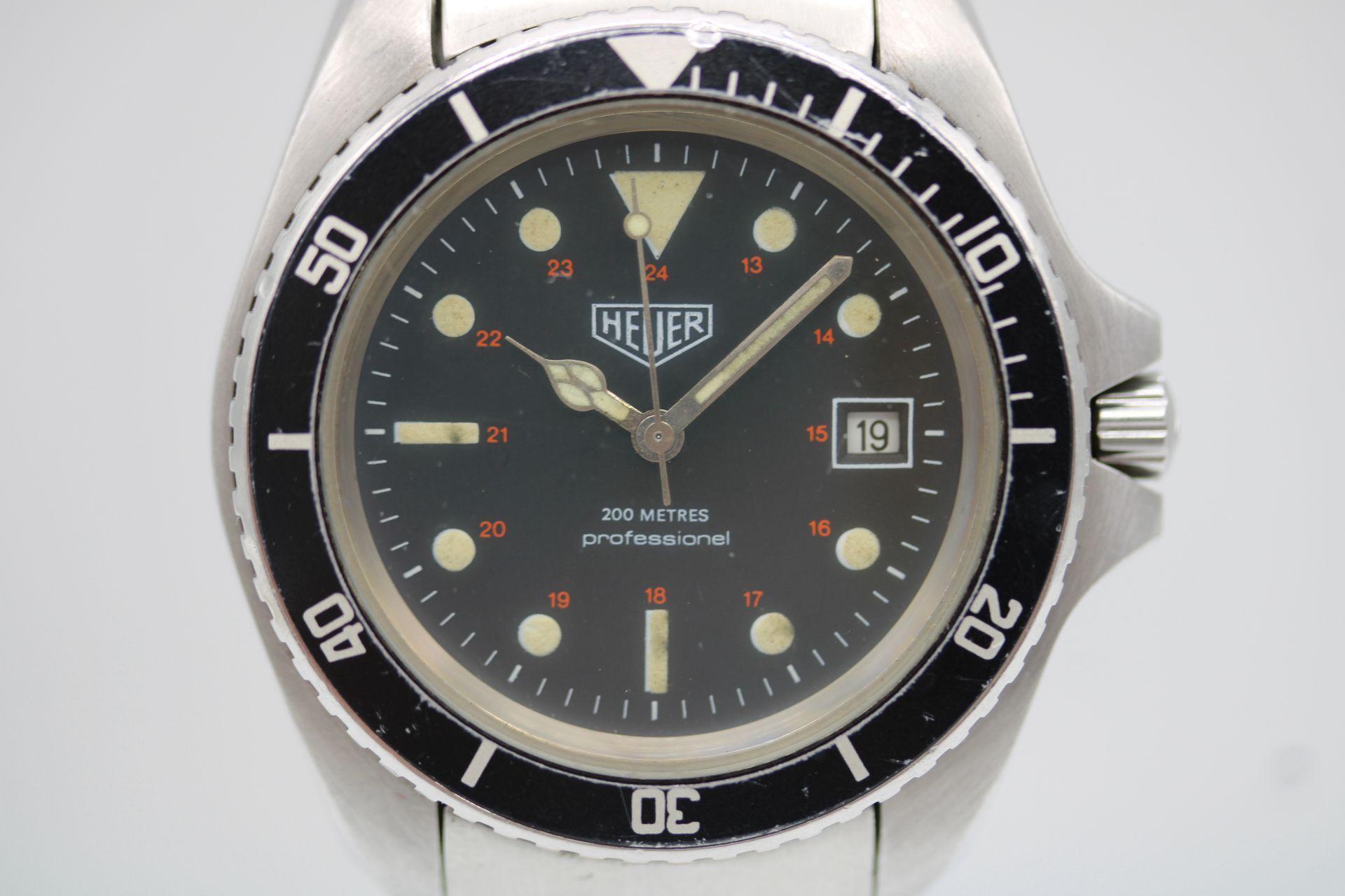 Heuer 844 Mark 1 - Buzo Vintage 1979  Caso G. Monnin  Automático suizo  Modelo icónico anterior a TAG Heuer

No se trata de un reloj de buceo vintage cualquiera: es el Heuer 844 Mark 1, el primer reloj de buceo fabricado por Heuer y, posiblemente,