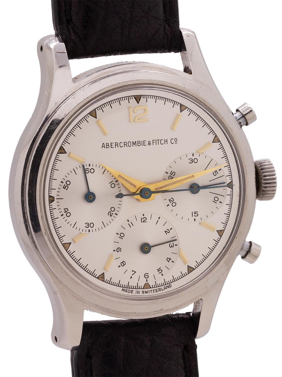 
Abercrombie & Fitch stainless steel manual wind chronograph made by Heuer, circa early 1960’s. 36mm stainless steel case with waterproof screw down caseback, stepped bezel, and small pump pushers. Powered by the not yet but soon to be famous