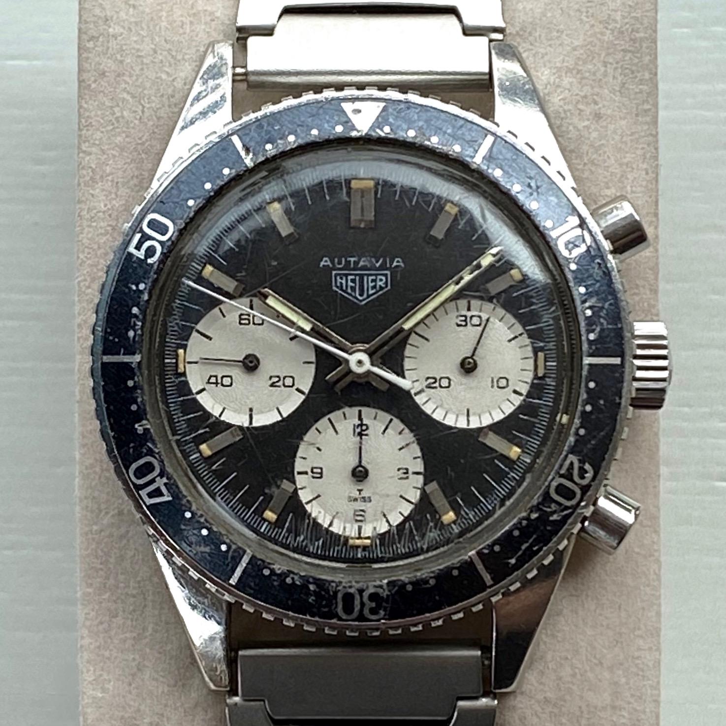 A super rare and highly sought after 1966 Heuer Autavia 2446M Transitional chronograph watch with 3rd execution dial and vintage stainless steel bracelet.

Formally identified in 2013, the intriguingly enigmatic Autavia 2446 Transitional was only