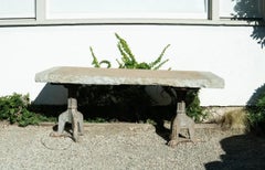 Hewn Stone + Cast Iron Table, Michael Taylor