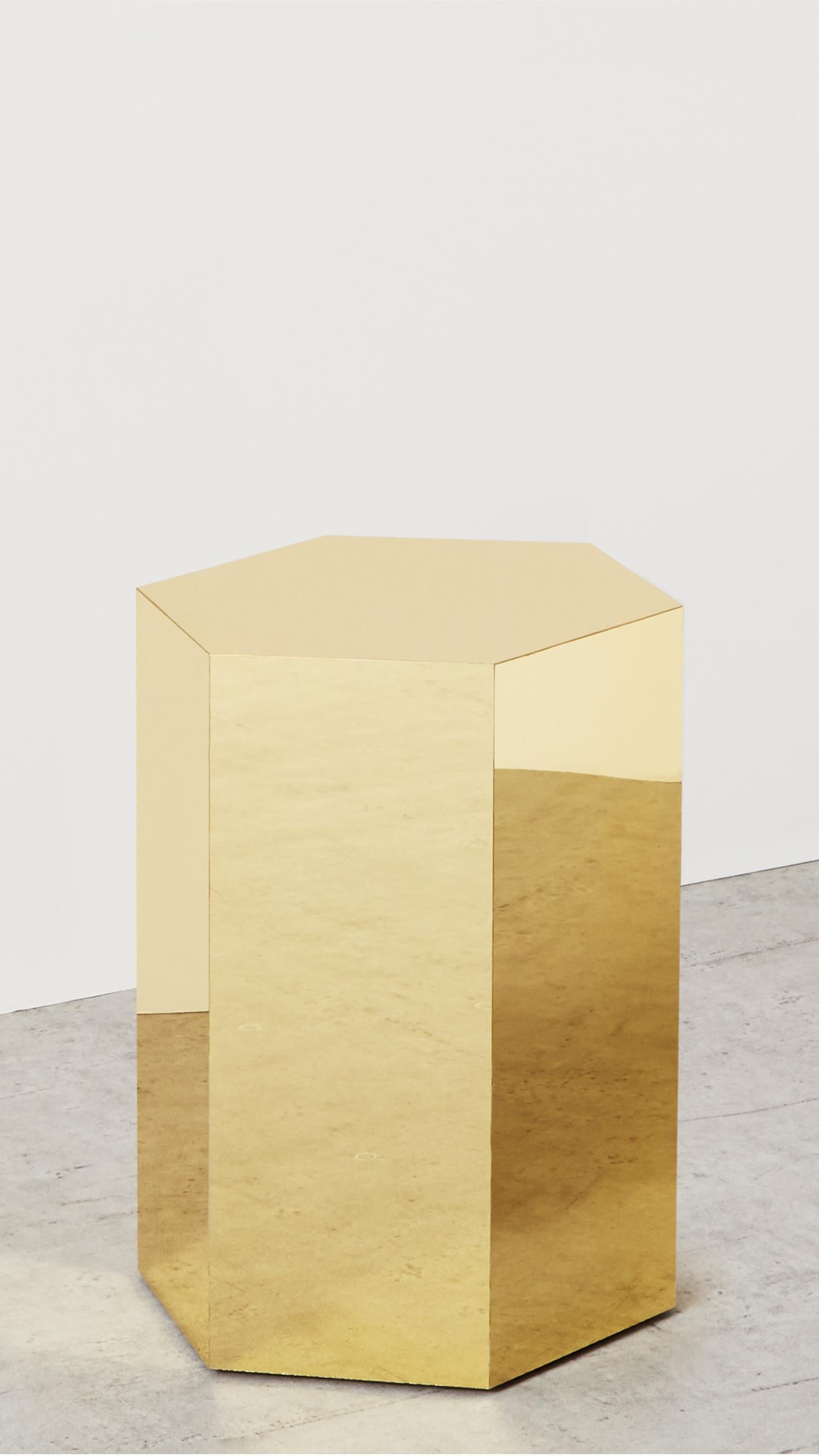Askew side table, Arielle Lichten 

A brass finish side table in a hexagonal shape.

Measures: 12” W x 12” L x 16” H

Material: Brass

Custom Sizes and finishes available

Arielle Lichtens work is rooted in a fascination with materials and