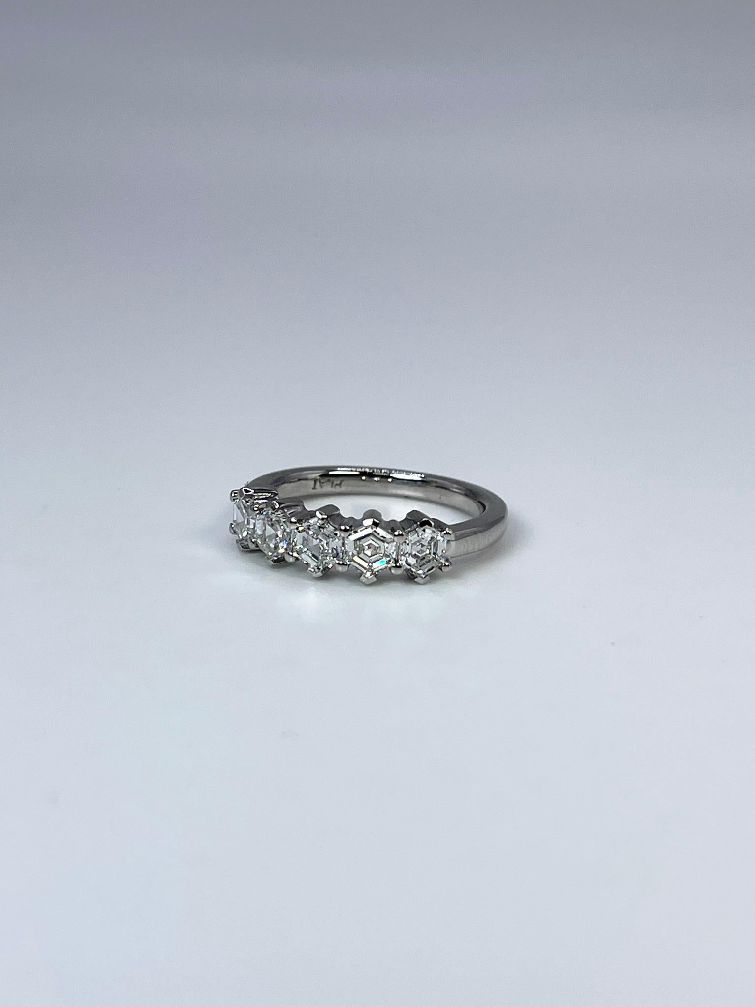 Diamond ring made in platinum with rare hexagon diamoands.

GRAM WEIGHT: 6.00gr
METAL: platinum

NATURAL DIAMOND(S)
Cut: hEXAGON
Color: F
Clarity: VS 
Carat: 1.24ct
Size: 6 ( can be re-sized)
Item number: 110-00026 KFFI


WHAT YOU GET AT STAMPAR