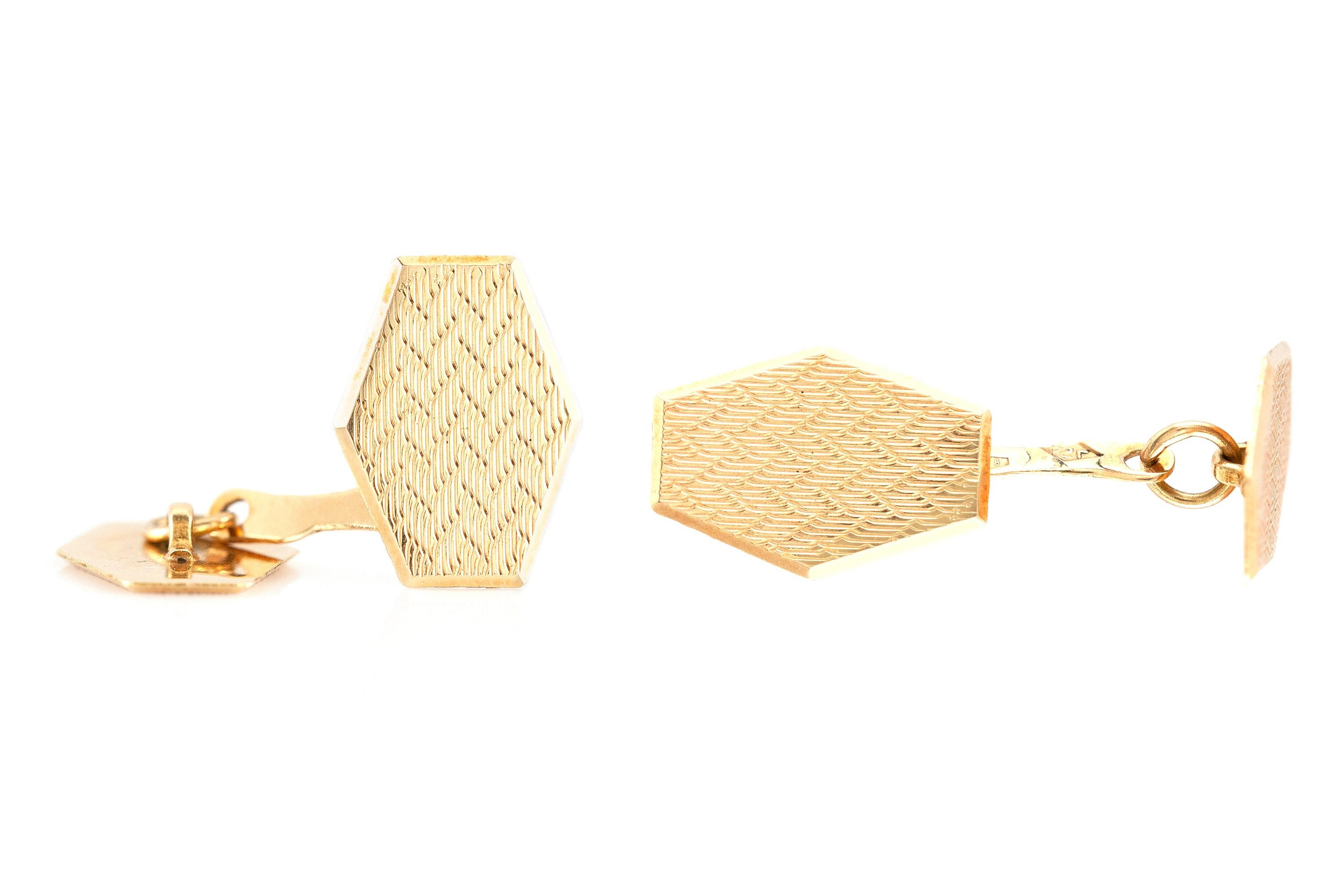 Cufflinks finely crafted in 18k yellow gold, weighing 3.6 dwt., size of each cufflink is 0.70 inch. Circa 1980.

