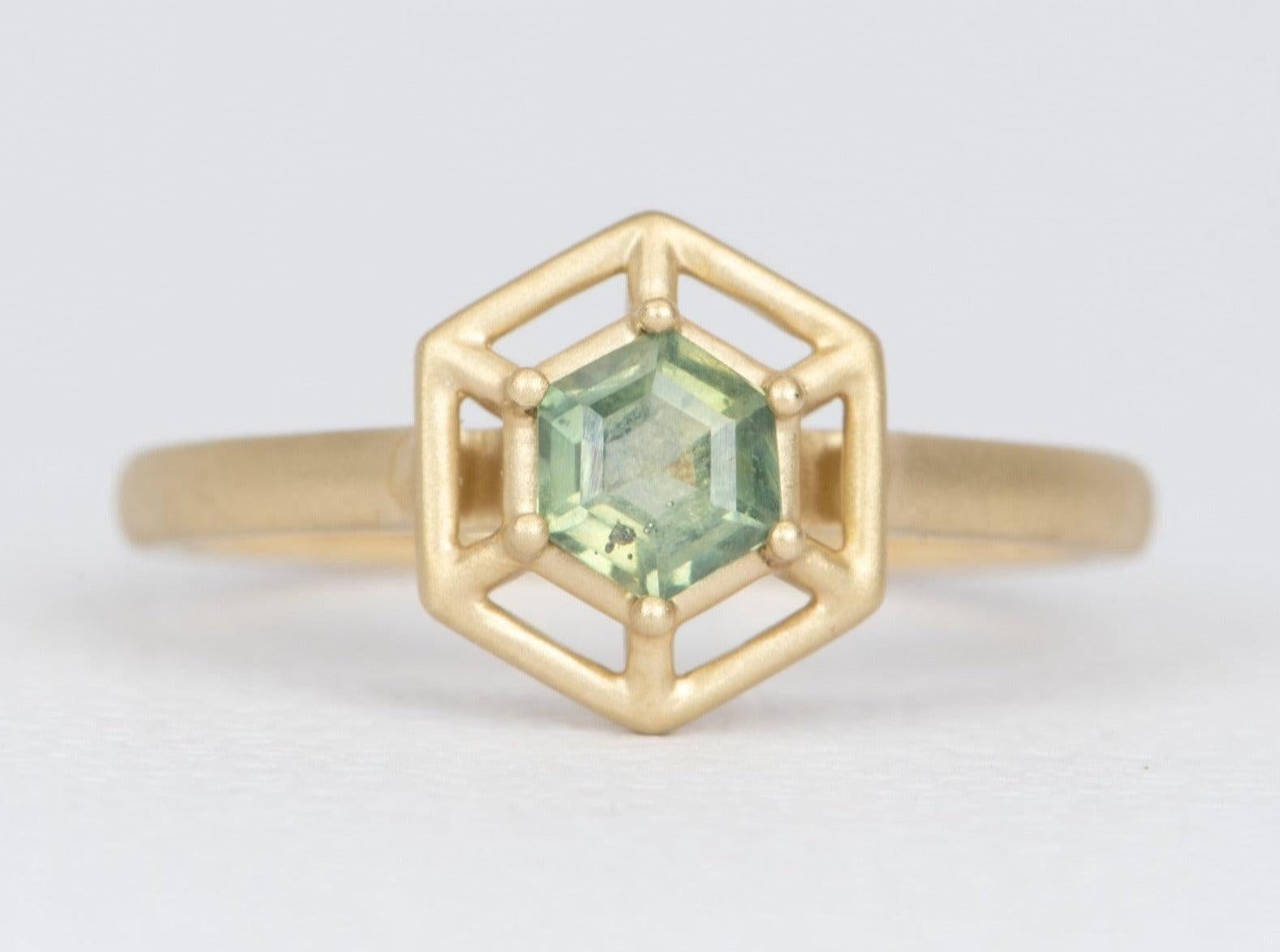 ♥ Solid 14K yellow gold ring set with a hexagon-shaped Montana sapphire in the center with a hexagon facet setting
♥  The ring measures 9.9 mm in length, 9 mm in width, and stands 4.9 mm tall from the finger.

♥ US Size: 7.25 (Free resizi8 mm
♥