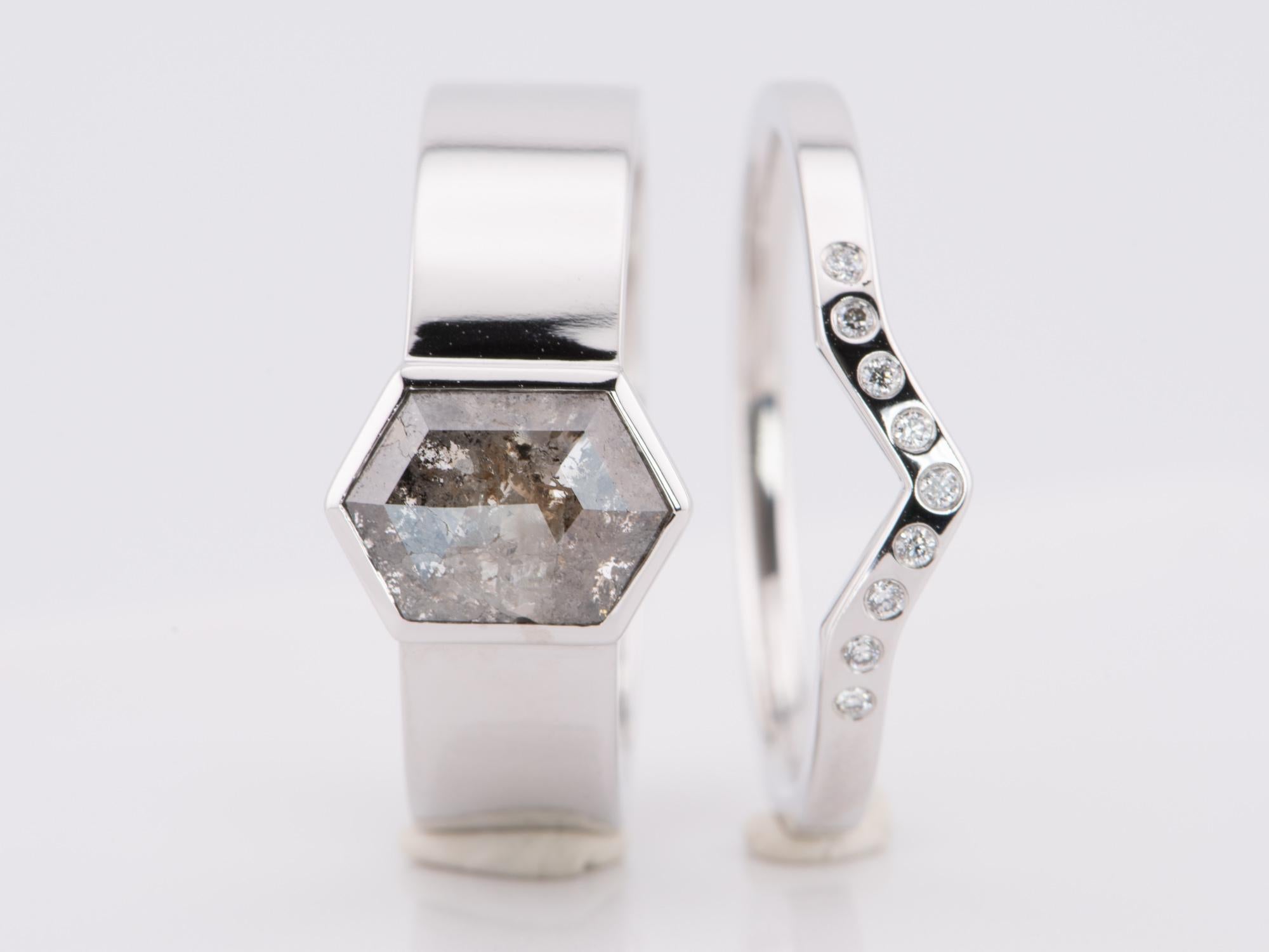 ♥ Solid 14K white gold ring set (2 rings are included in this purchase) with a hexagon salt and pepper diamond in a bezel setting; paired with a matching V-shaped wedding band flush set with brilliant natural diamonds
♥ Modern design, with a