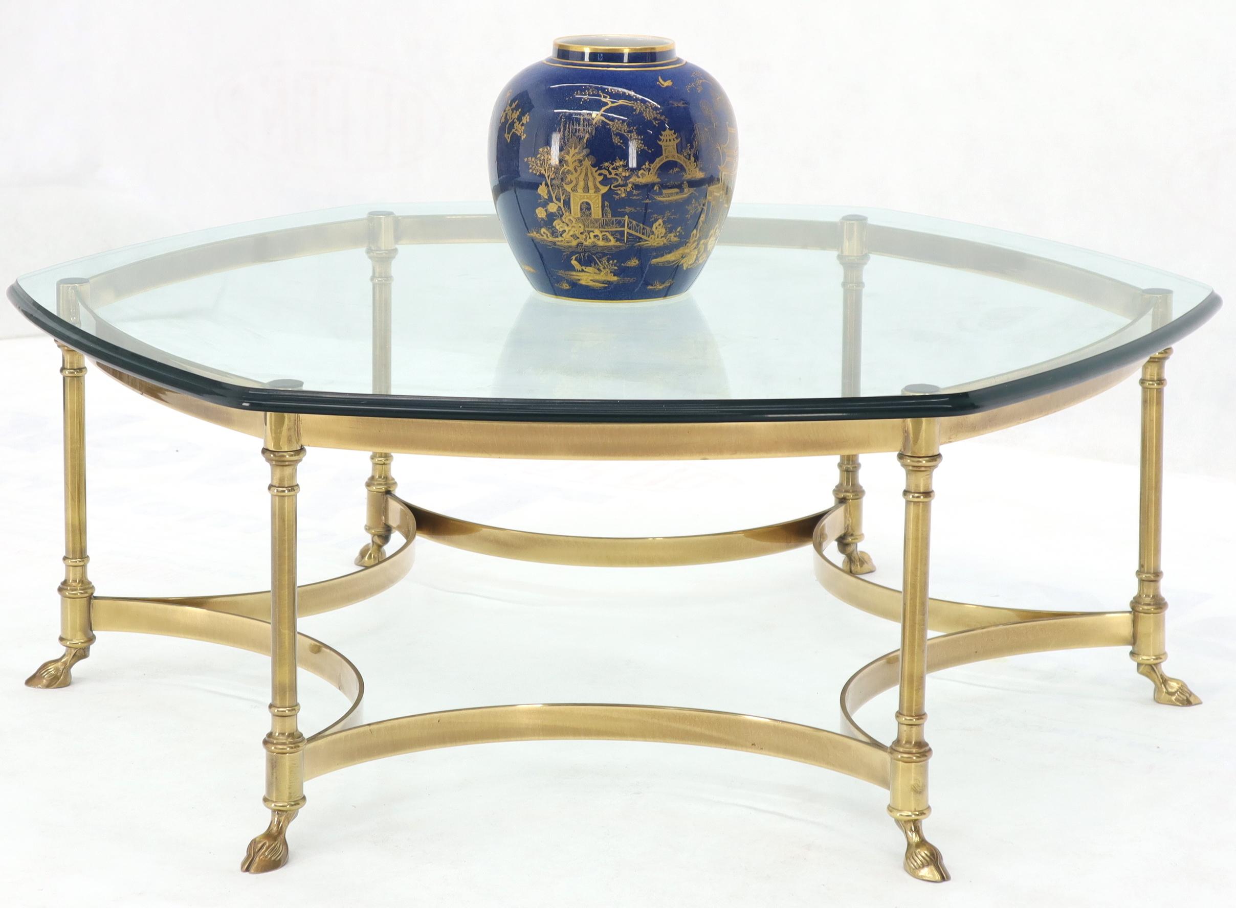 Midcentury Italian modern forged brass frame hoof feet round coffee table.