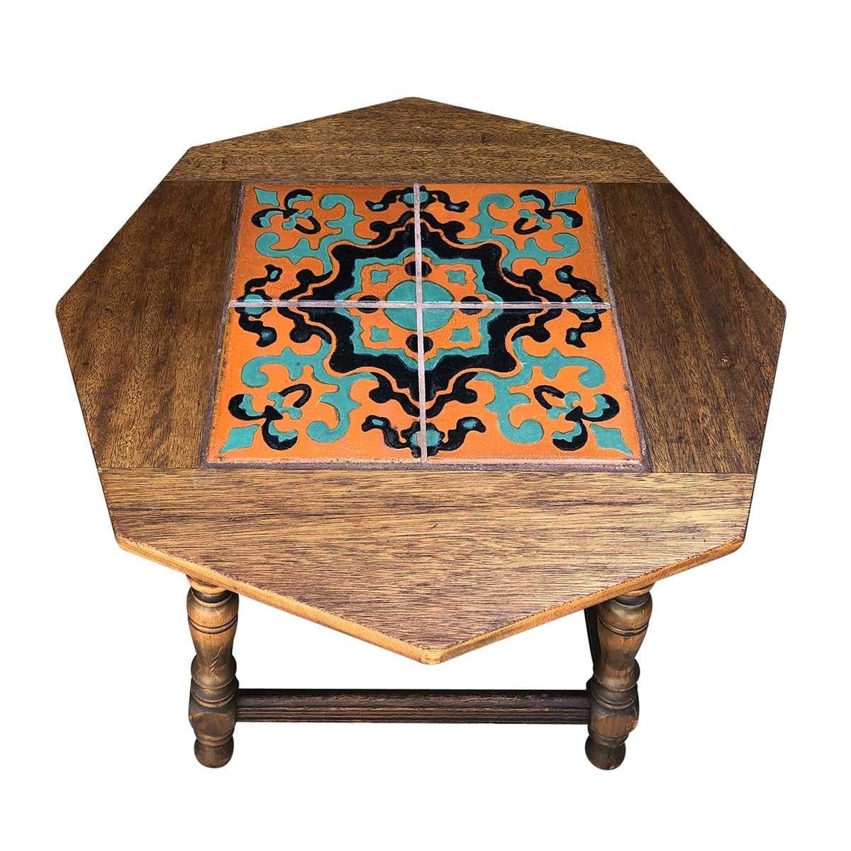 Beautiful octagonal mission style table with beautiful natural raw wood with great patina, the ceramic tiles are beautifully hand painted with bright and subtle colors to give an amazing contrast to color along with the patina of the