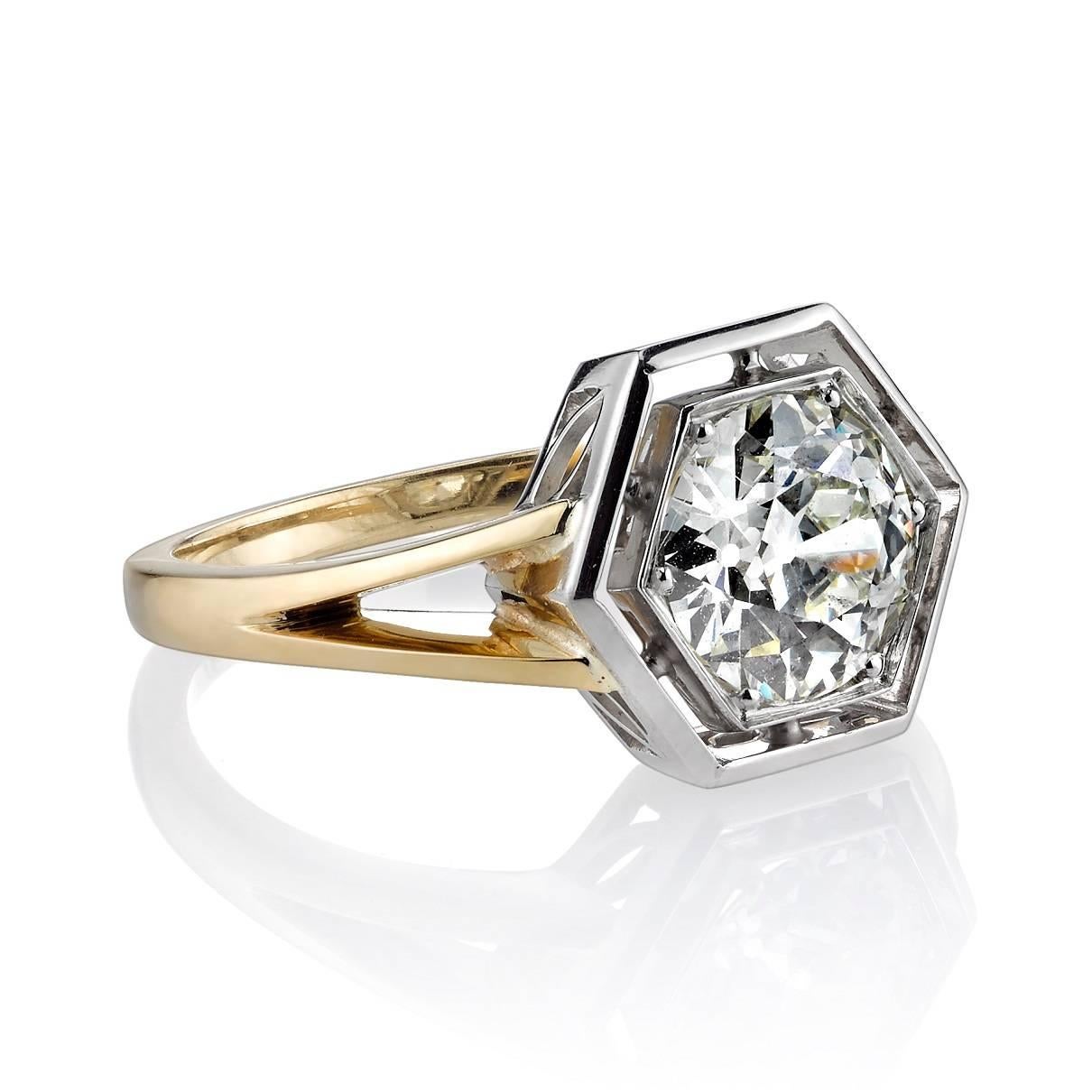 1.40ct K/VS1 EGL certified old European cut diamond set in a handcrafted platinum and 18k yellow gold mounting. This Art Deco inspired setting a beautiful two toned setting. 