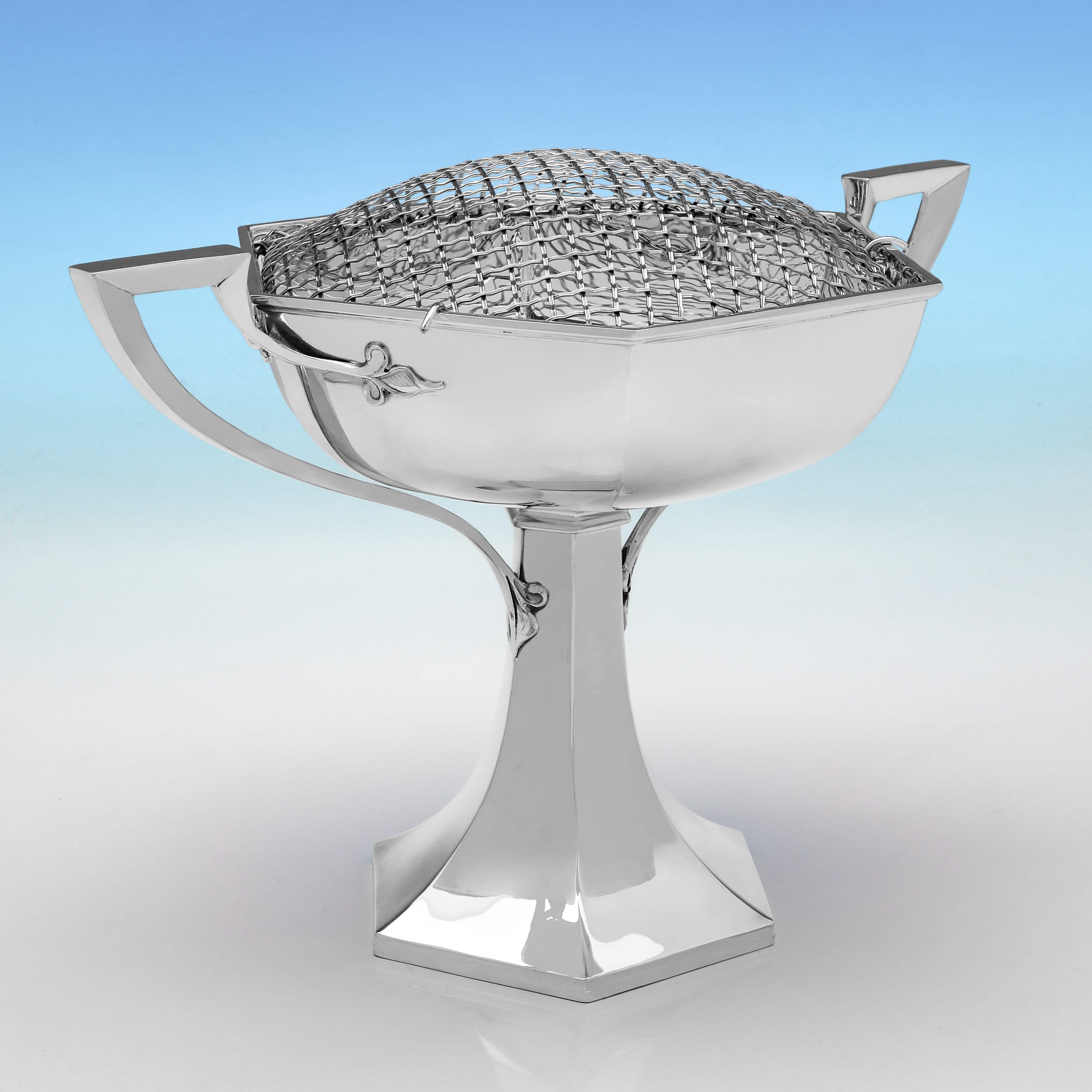 Hallmarked in Sheffield in 1913 by Walker & Hall, this handsome, George V period, Antique Sterling Silver Rose Bowl, is hexagonal in shape, and plain in design. The rose bowl measures 9.75