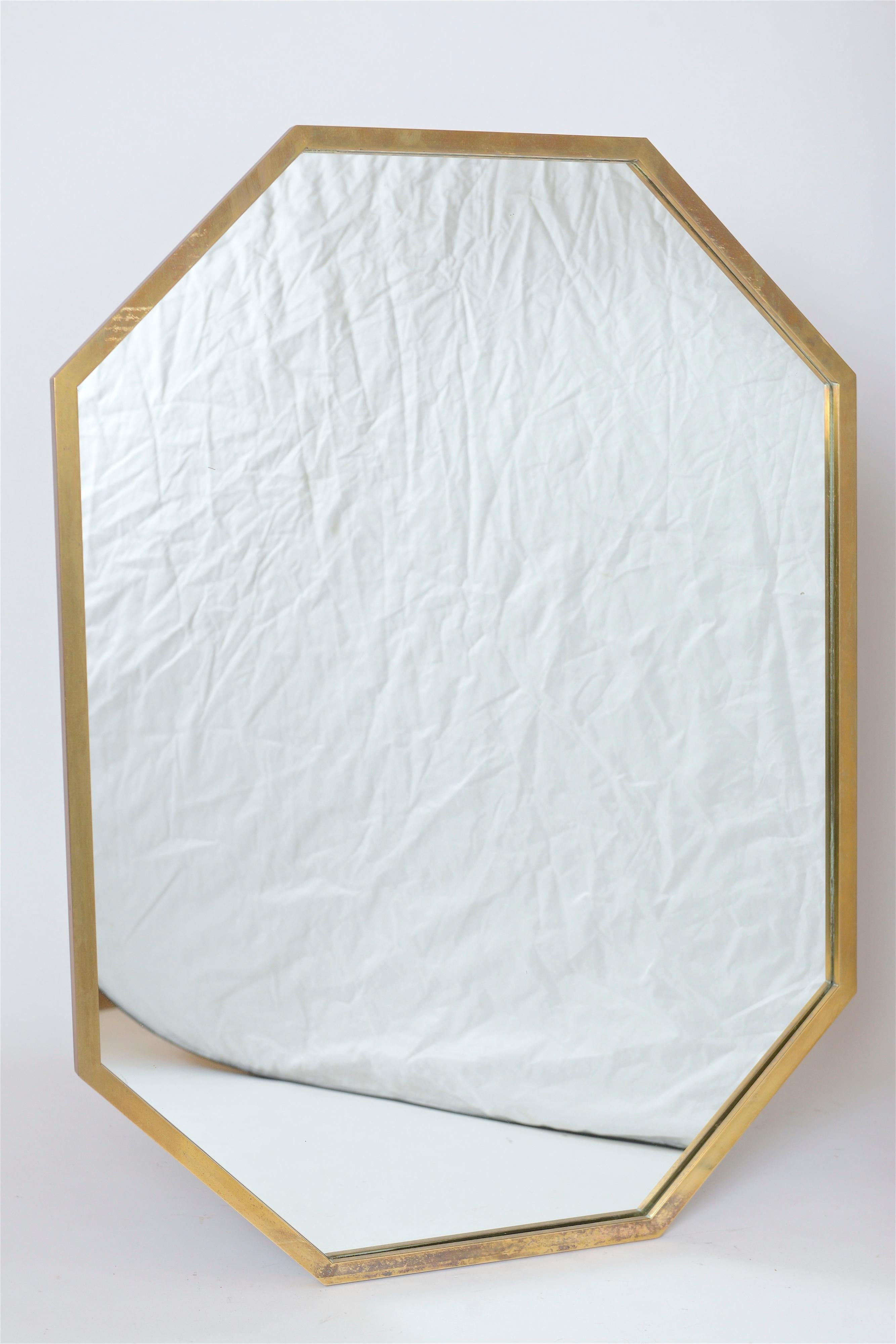 Italian midcentury mirror with brass frame

Nice patina to brass. Mirror in very, very good condition.