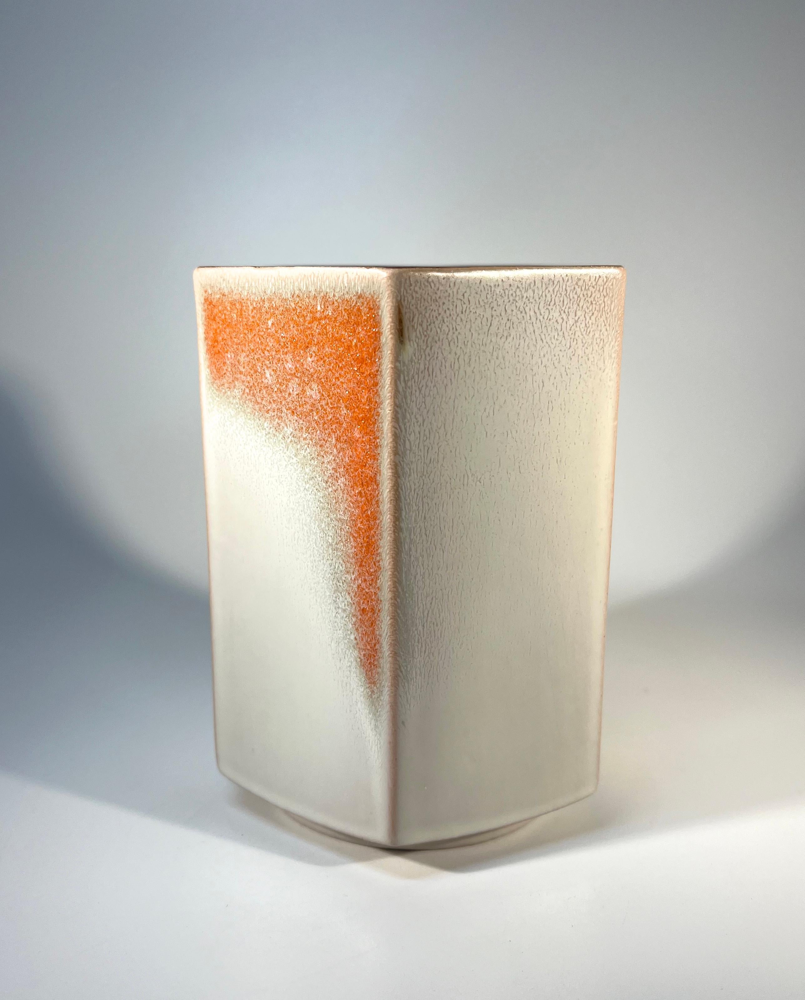 Hexagonal white and terracotta glazed vase by Knabstrup, Denmark 
Rich dark brown glazed interior
Circa 1960-65
Signed Knabstrup to base
Height 4.75 inch, Width 3.75 inch, Depth 3.75 inch
In good condition, minor fleabite on outer lower angle -