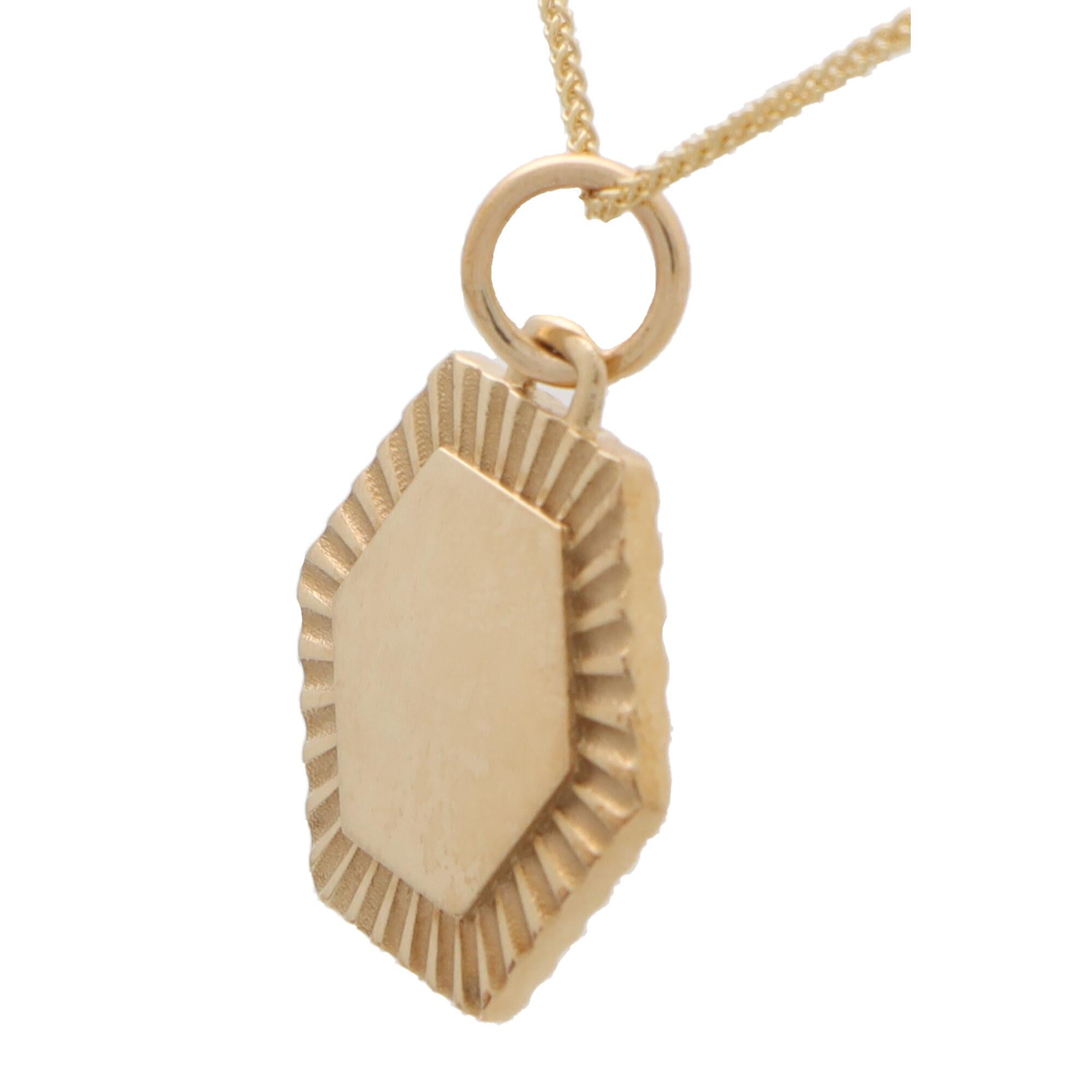 Modern Hexagonal Coin / Disc Pendant Set in Solid 9k Gold For Sale