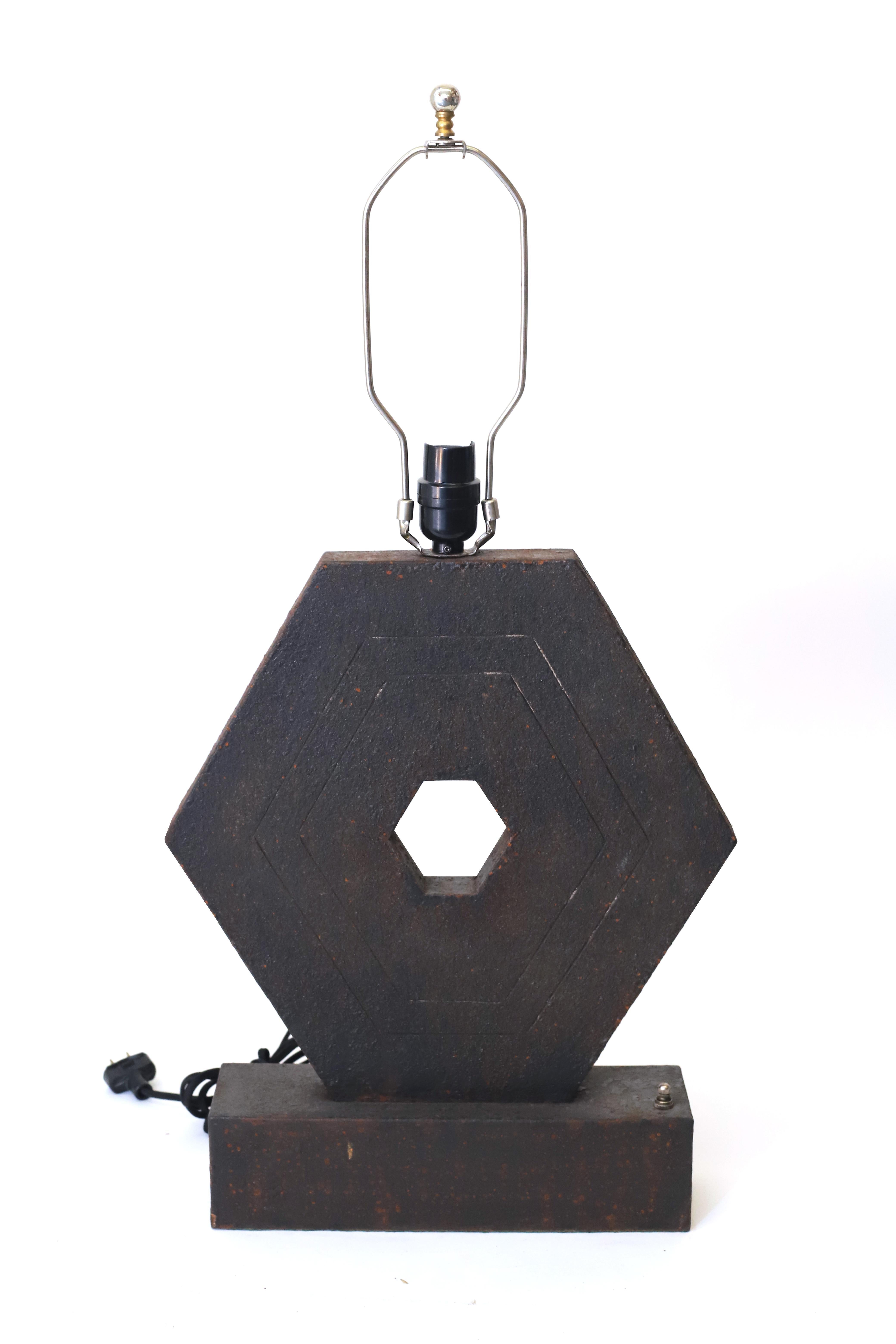 Custom made hexagonal oxidized metal table lamp designed by Juan Montoya. This geometric piece will add a unique look to any room. 

Property from esteemed interior designer Juan Montoya. Juan Montoya is one of the most acclaimed and prolific