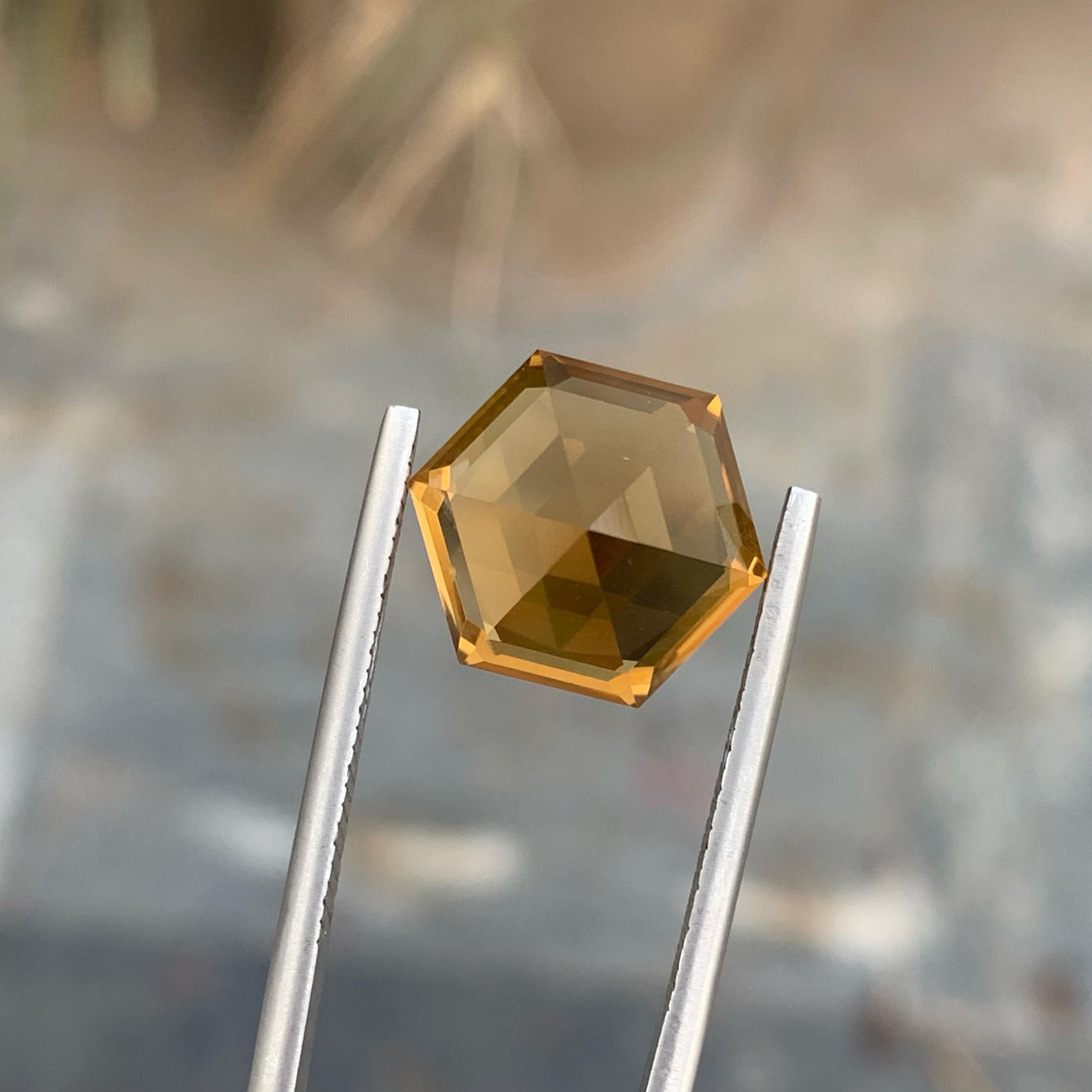 Weight 8.45 carats 
Dimensions 14.3 x 12.3 x 9.6 mm
Treatment None 
Origin Brazil 
Clarity Loupe Clean 
Shape Hexagonal 
Cut Hexagon 



Explore the captivating beauty of our Hexagonal Orange Citrine, a stunning 8.45 carat gemstone with a unique