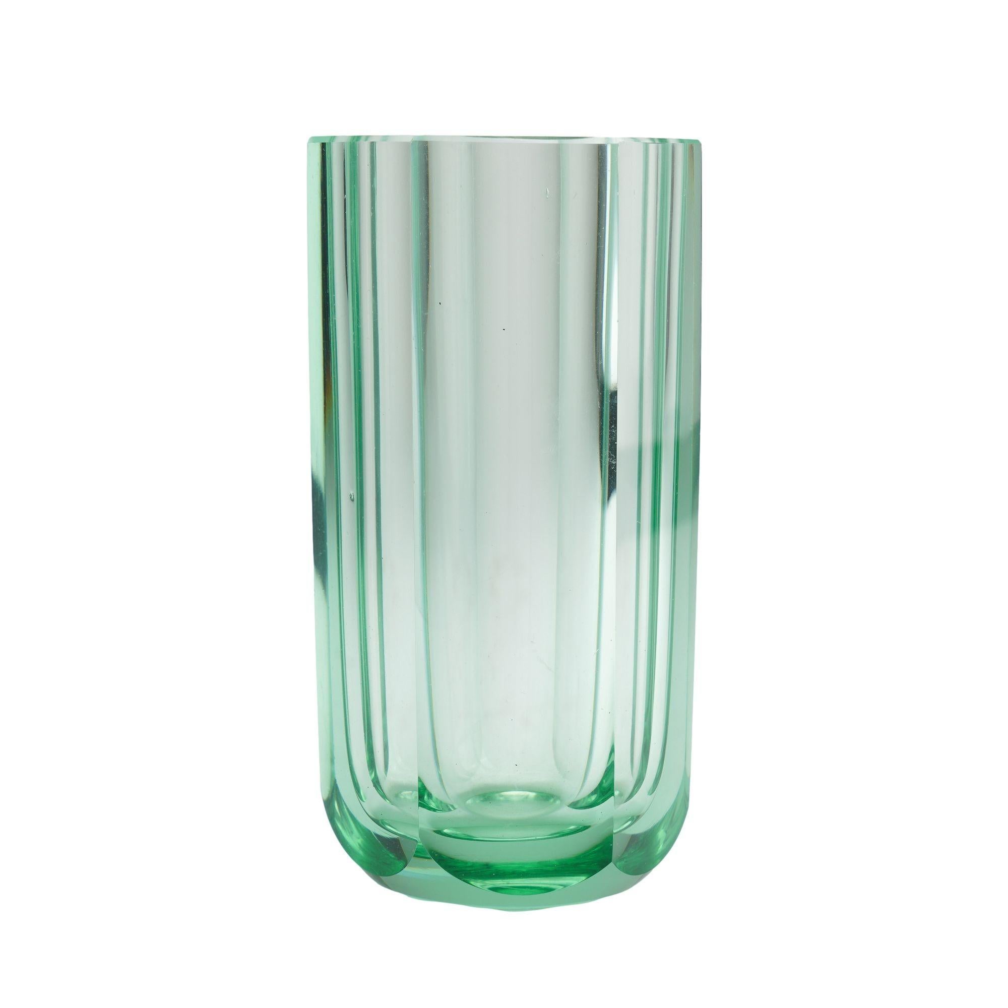 Hexagonal panel cut blown glass vase in translucent acid green. The foot of the vase is undercut at the base of each panel and has a ground and polished pontil. Unsigned.

Czech or Finnish, 1950-70.