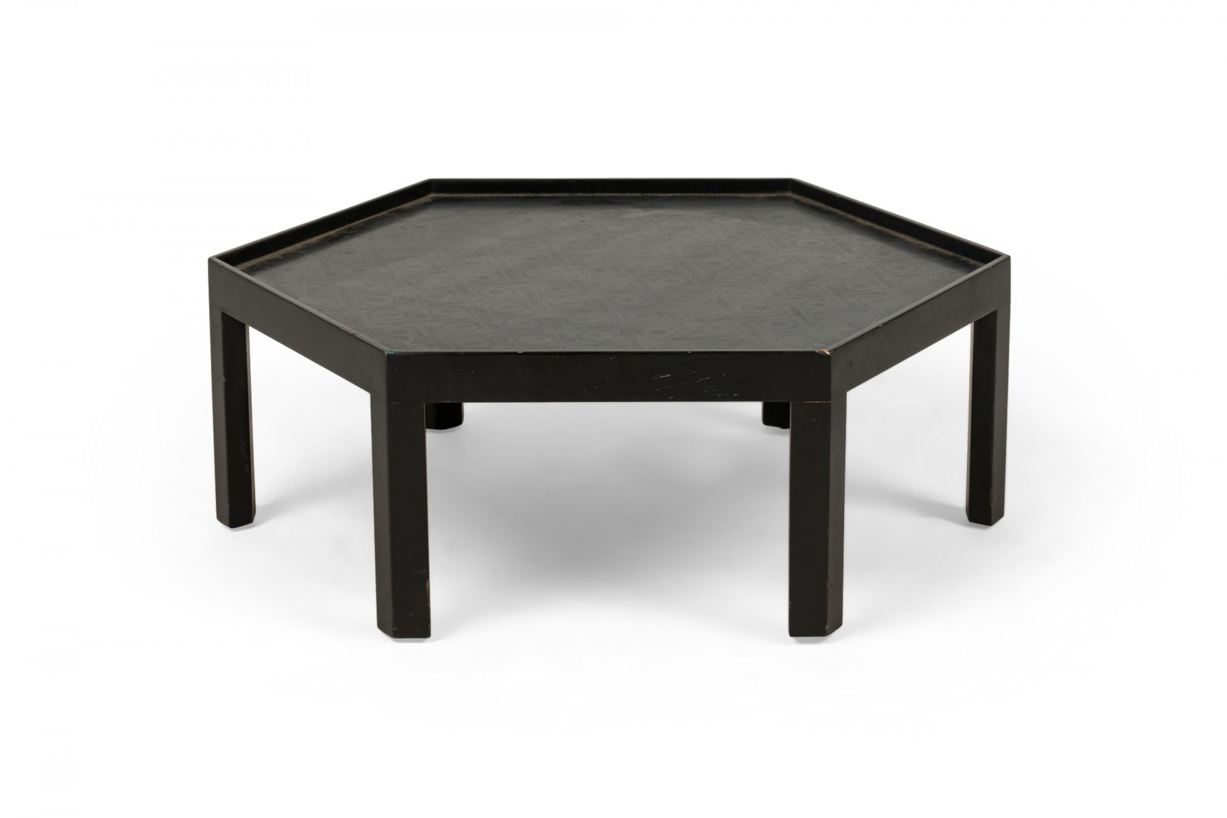 Mid-Century American hexagonal wooden ottoman with raised edges, and a mint green upholstered cushion in a geometric pattern, standing on five-sided shaped legs.

Condition: Good; Minor losses (Frame height 10.5