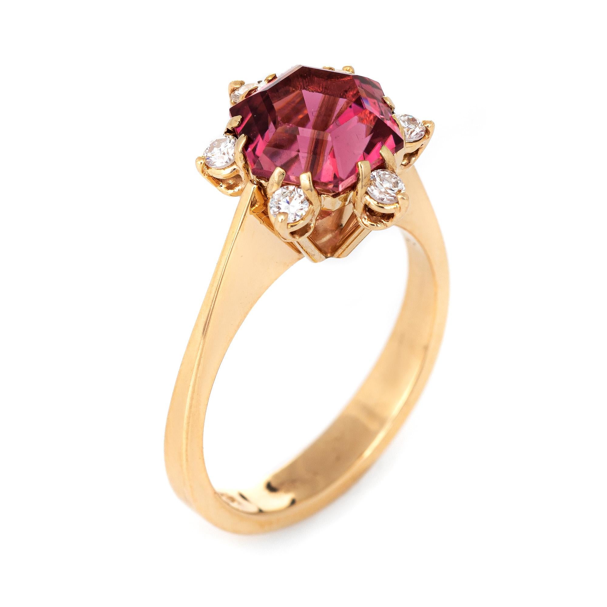 Stylish vintage hexagonal cut pink tourmaline & diamond ring (circa 1970s to 1980s) crafted in 18 karat yellow gold. 

The pink tourmaline measures 8.5mm and estimated at 2 carats. The six diamonds are estimated at 0.02 carats each and total an