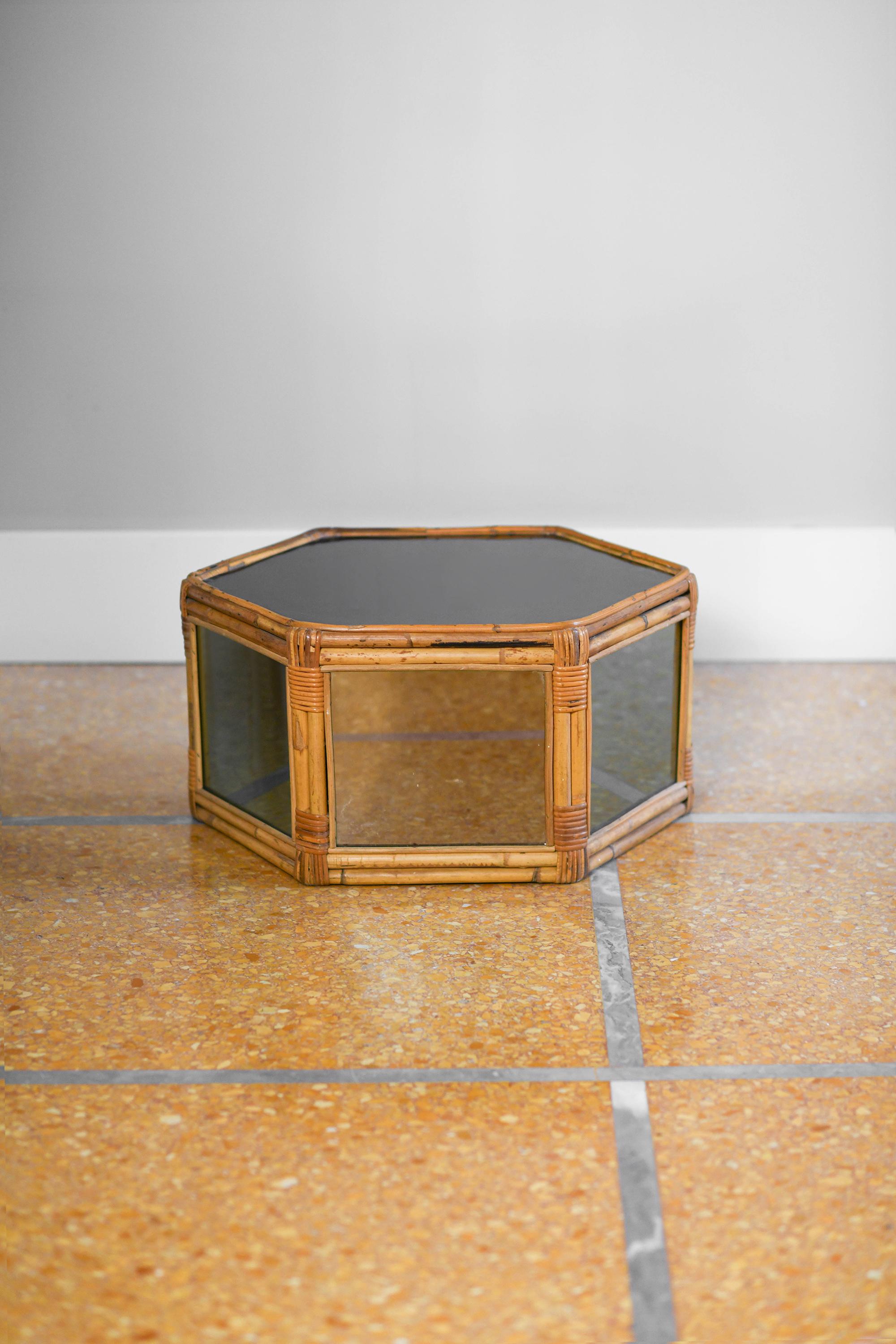 Hexagonal rattan coffee table, smoked mirrored glass and black methacrylate
Product details
Dimensions: 60 W x 30 H x 60 D