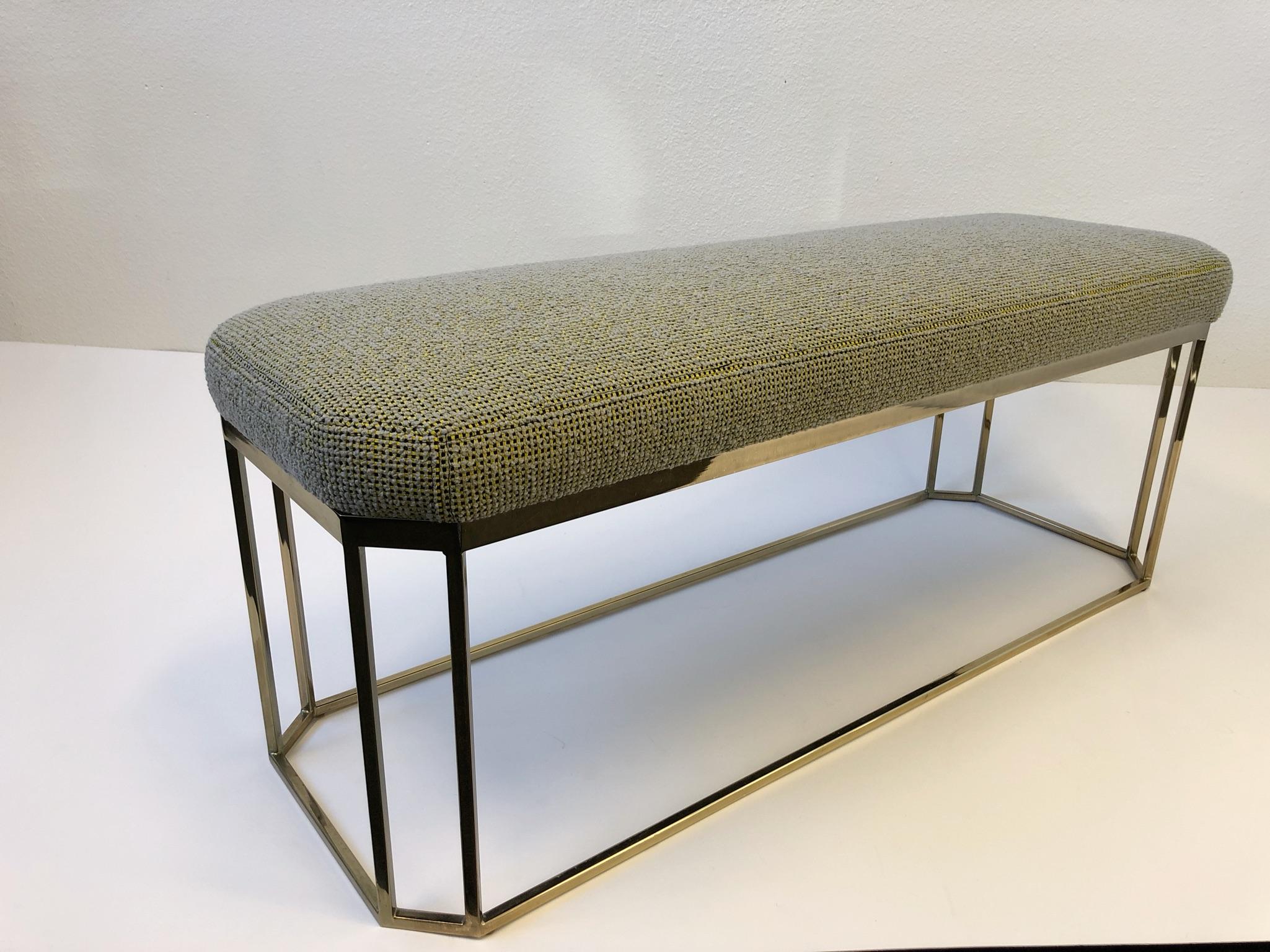 A glamorous 1970s hexagonal shape “Thin Line” polish brass bench by Milo Baughman. The bench has been newly recovered in this beautiful natural wool with yellow and black in a grid pattern (see detail photos) the brass frame is in original