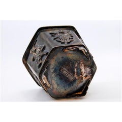 Hexagonal silver compote dish with embossed floral motifs