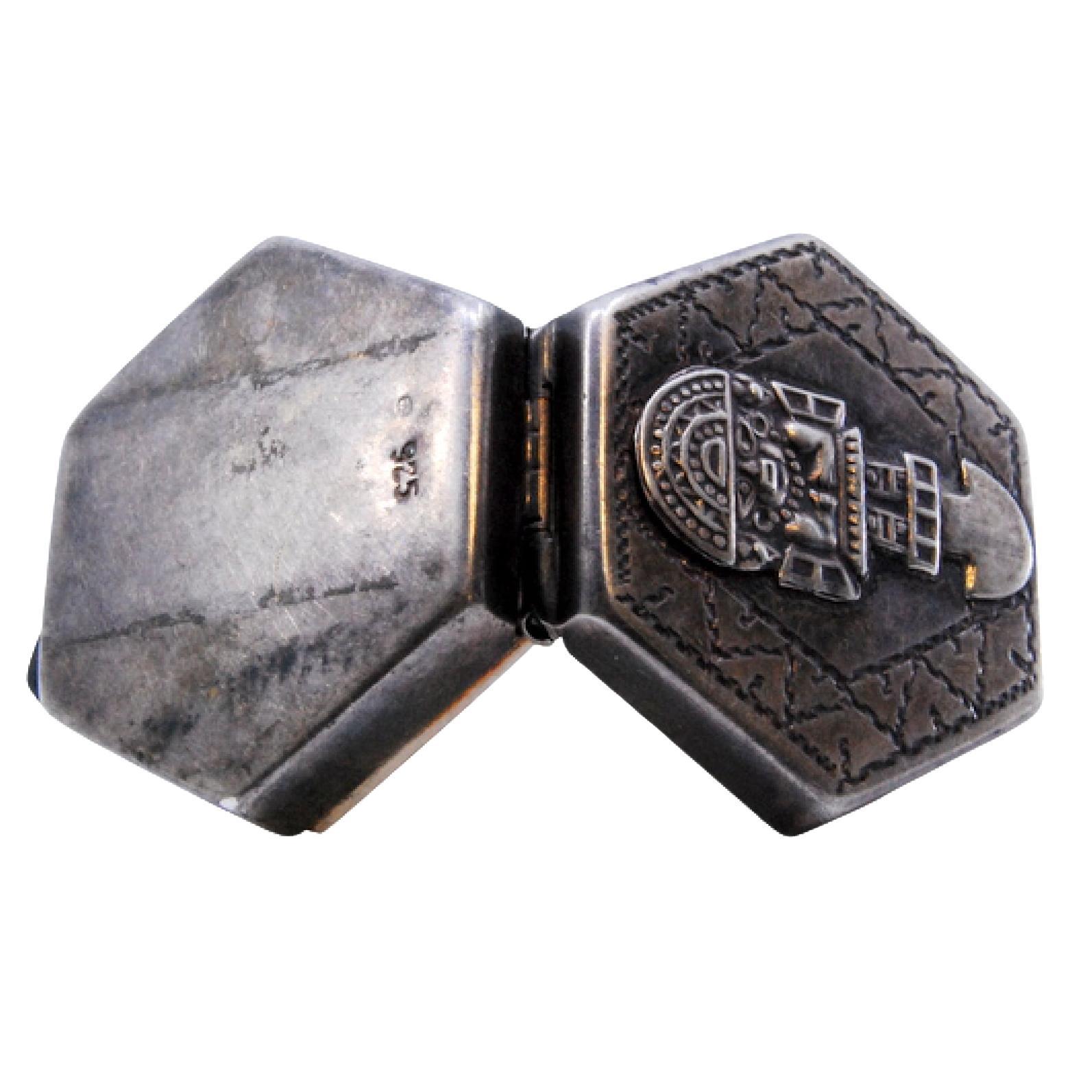 Hexagonal silver pill box with Aztec figure on the hinged lid